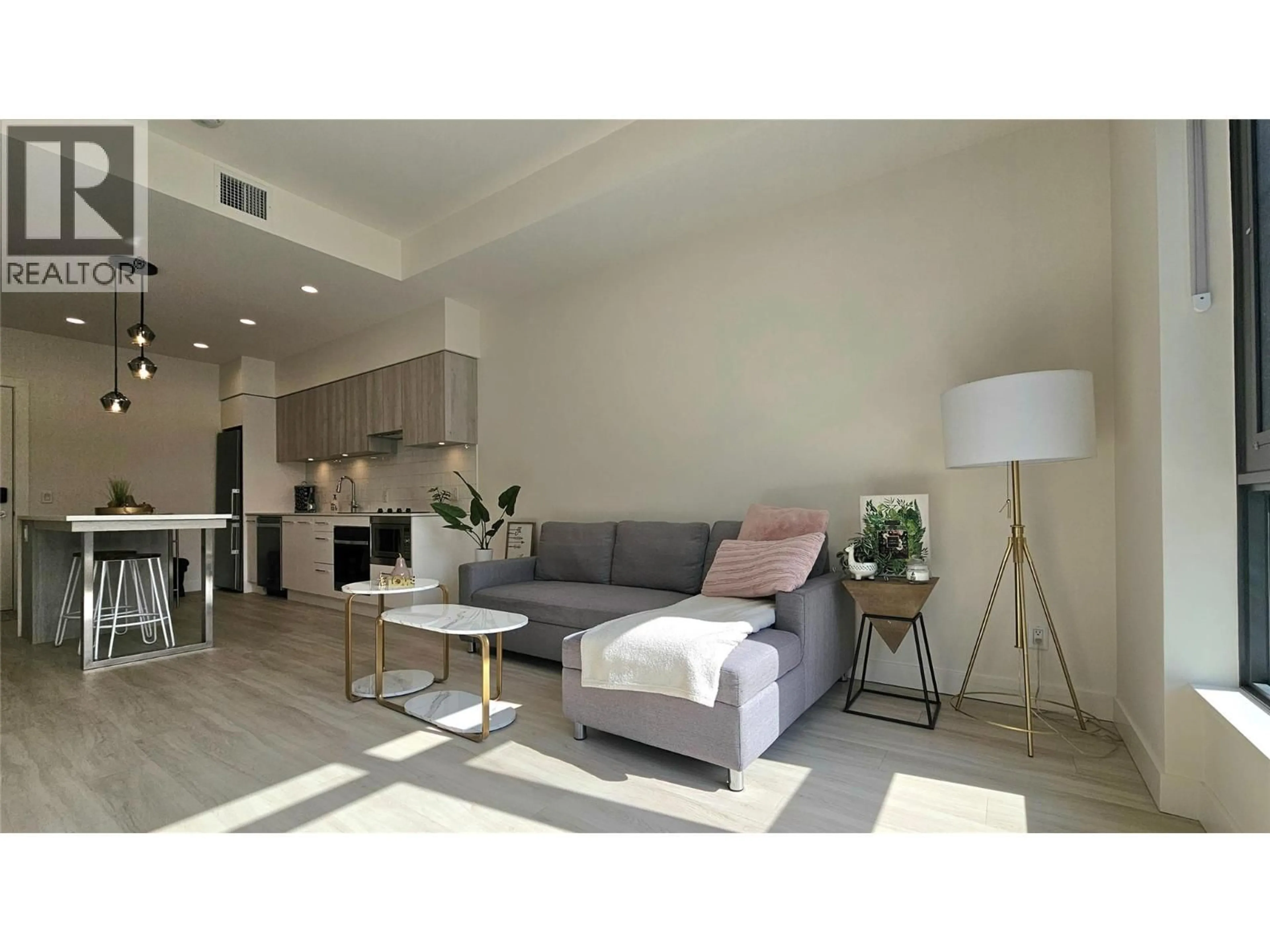 Living room with furniture, unknown for 104 - 3699 CAPOZZI ROAD, Kelowna British Columbia V1W0G3