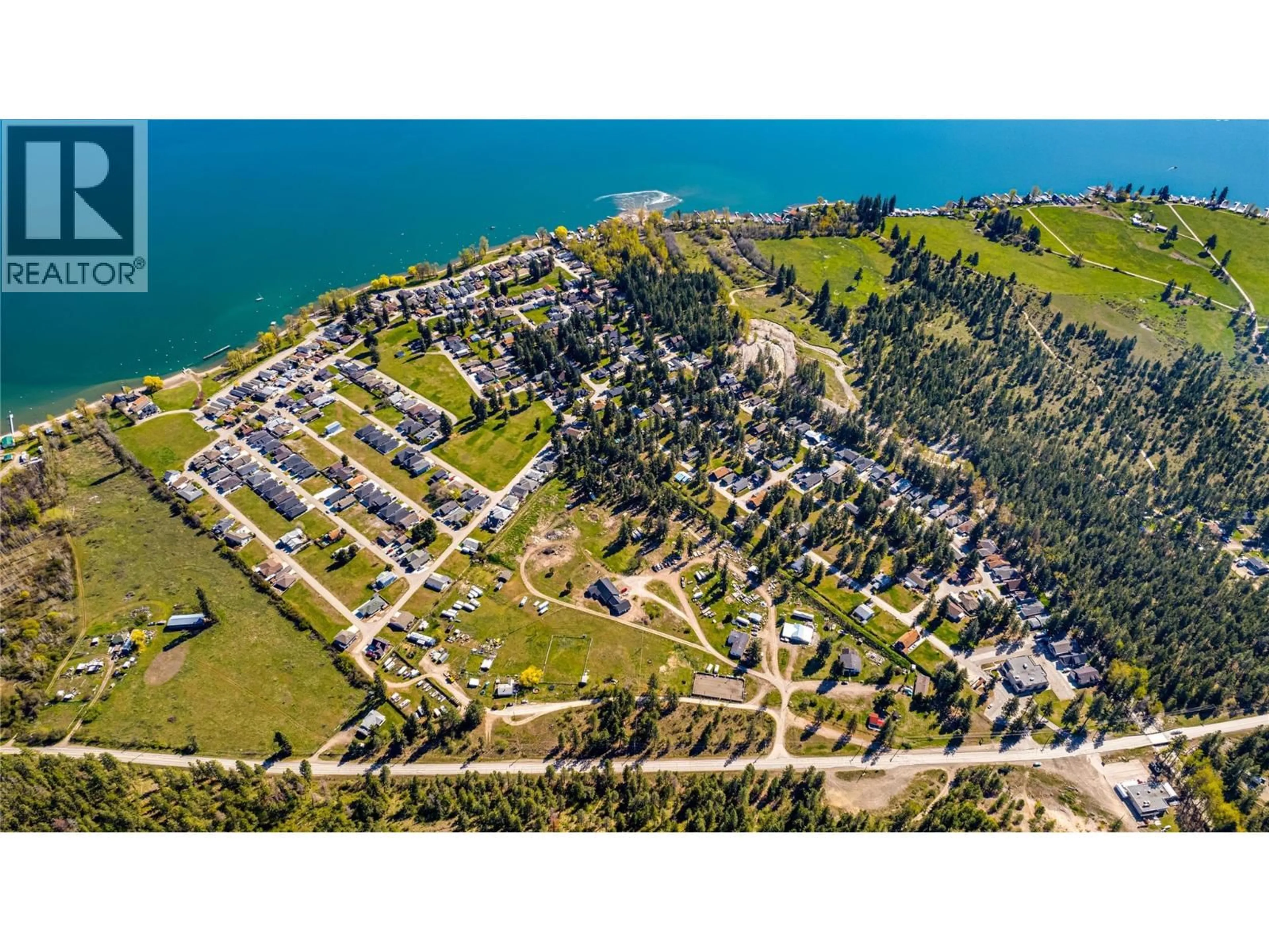 A pic from outside/outdoor area/front of a property/back of a property/a pic from drone, street for 592 NIGHTHAWK AVENUE, Vernon British Columbia V1H2A1