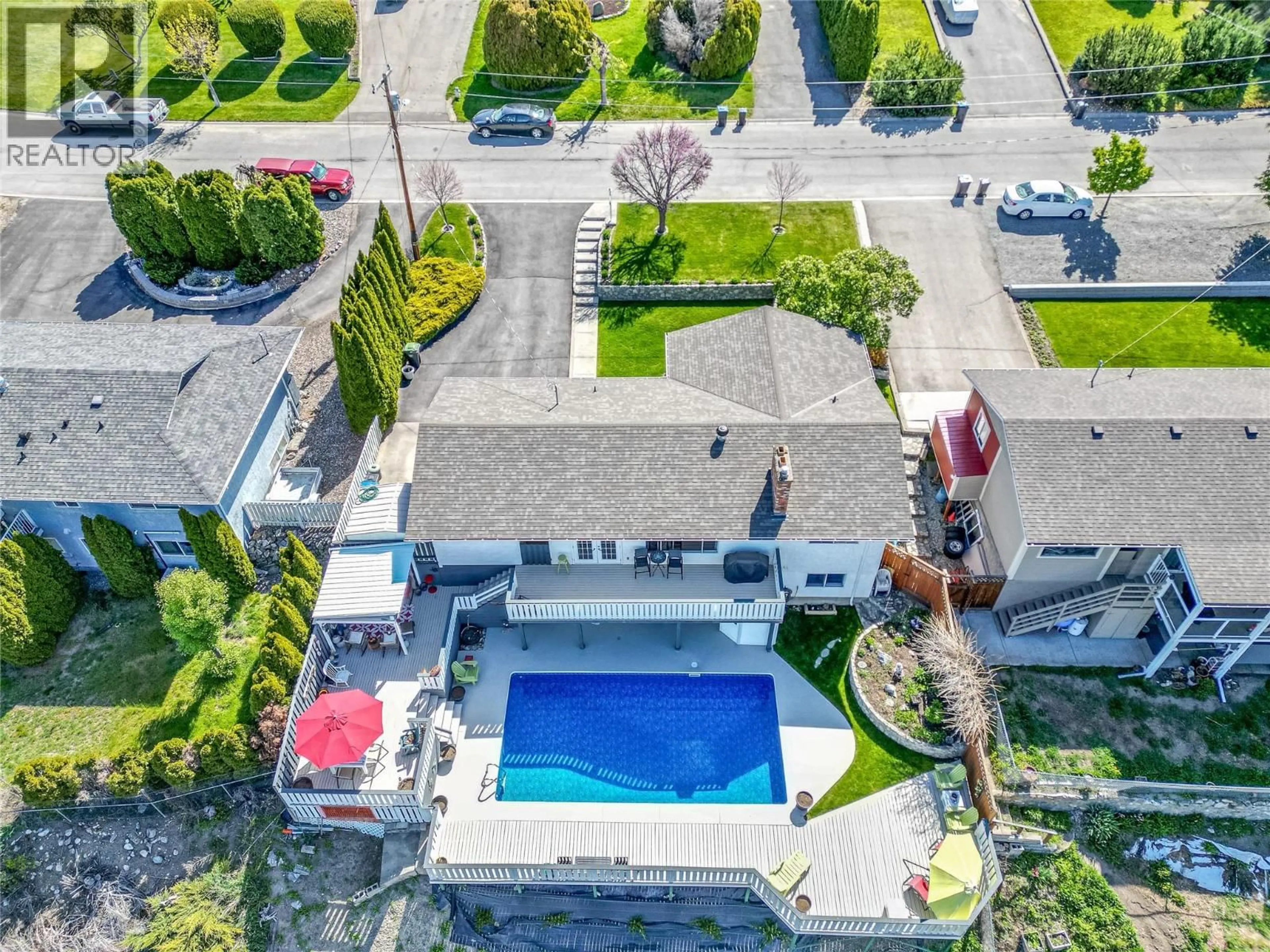 A pic from outside/outdoor area/front of a property/back of a property/a pic from drone, street for 490 SEAFORD ROAD, Kelowna British Columbia V1X5L4