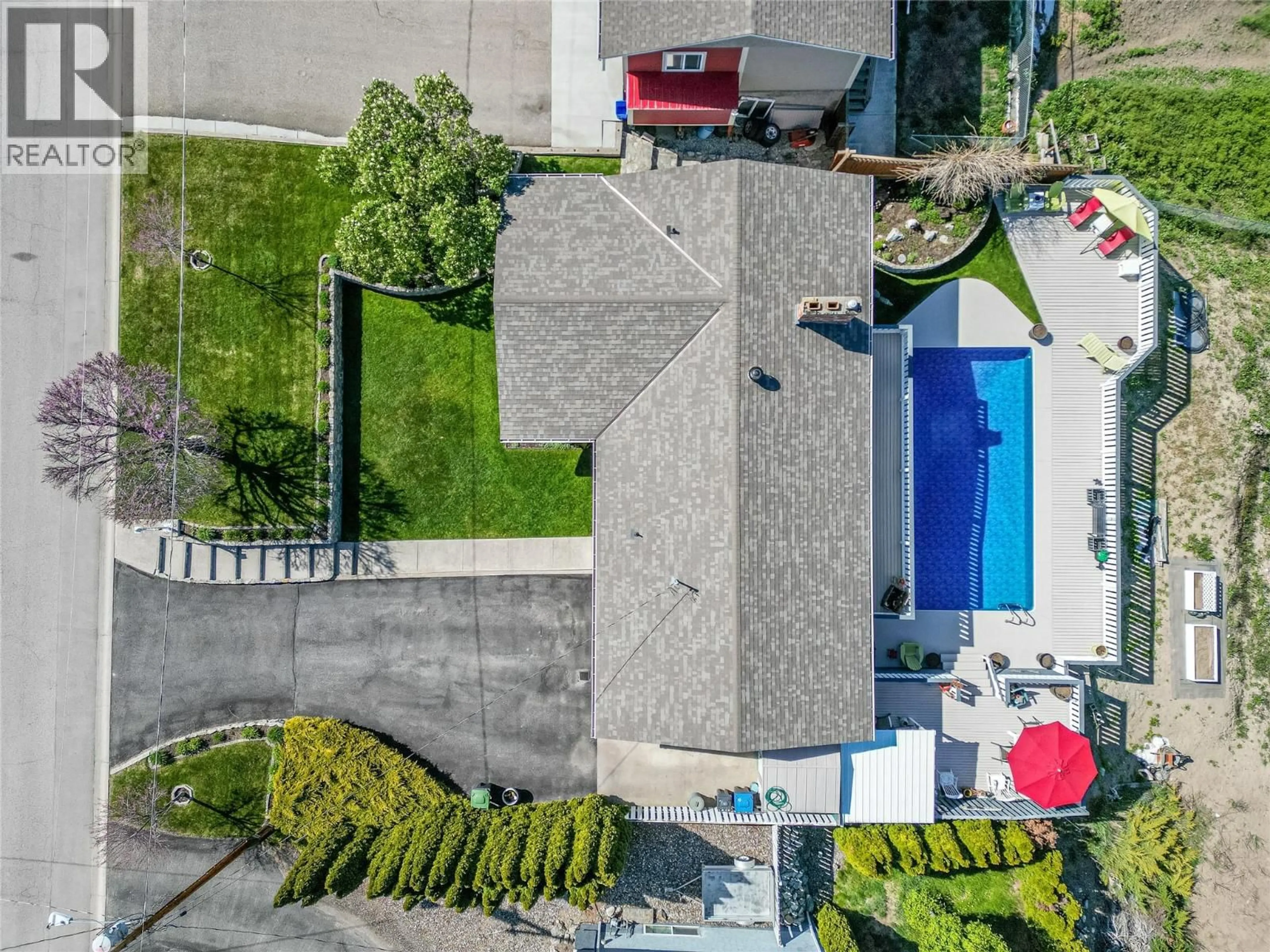 A pic from outside/outdoor area/front of a property/back of a property/a pic from drone, street for 490 SEAFORD ROAD, Kelowna British Columbia V1X5L4