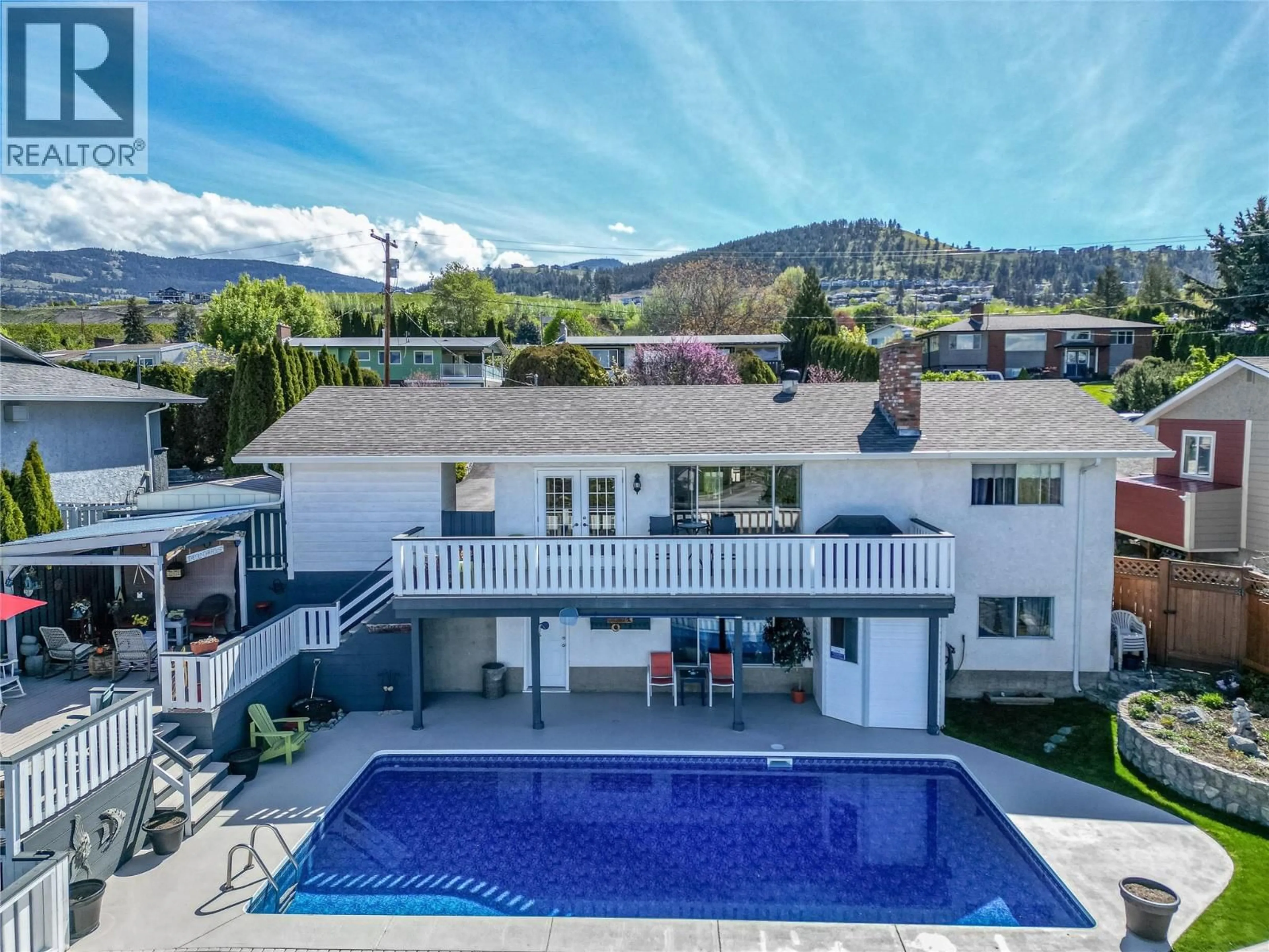 A pic from outside/outdoor area/front of a property/back of a property/a pic from drone, mountain view for 490 SEAFORD ROAD, Kelowna British Columbia V1X5L4
