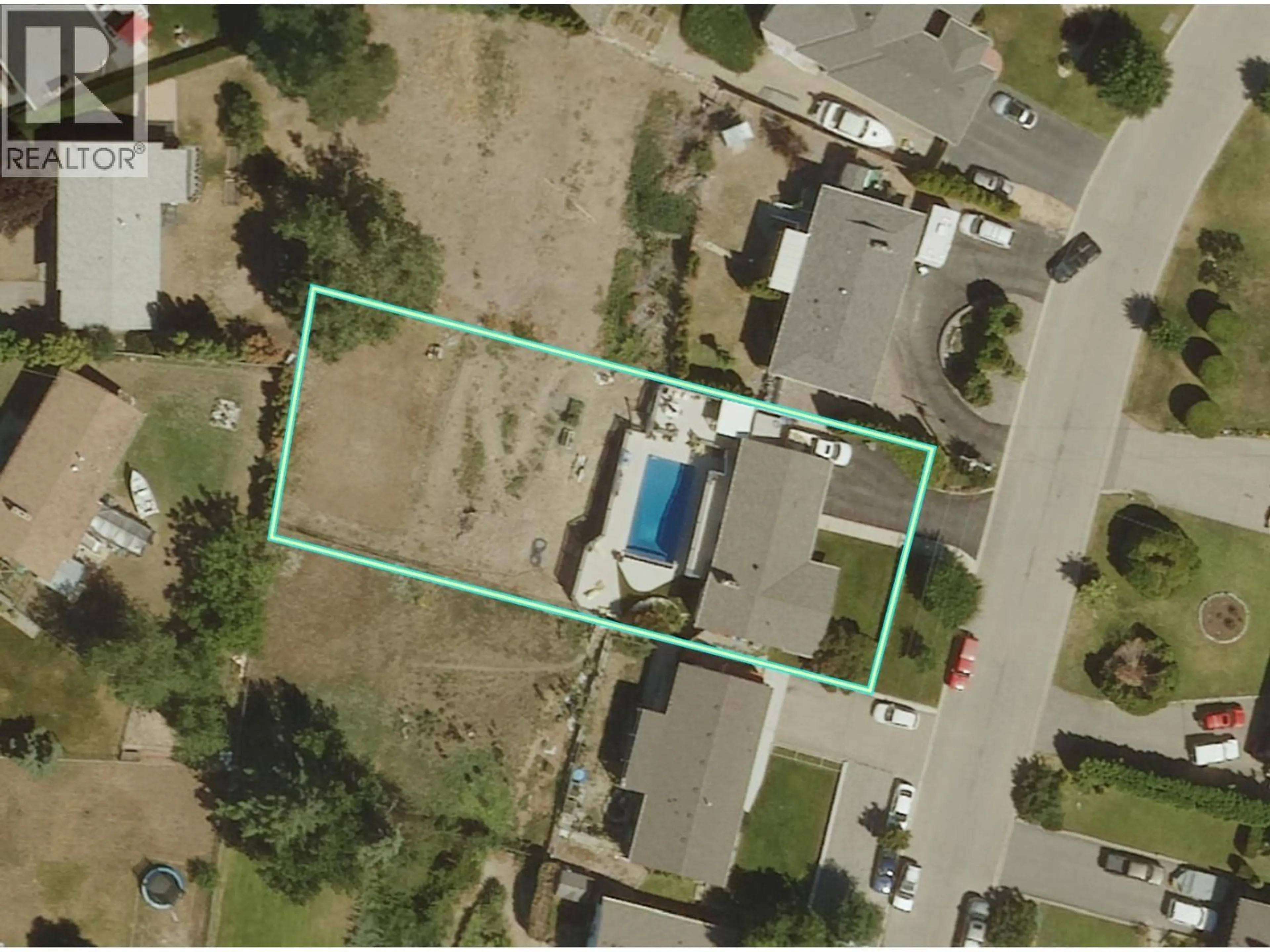 A pic from outside/outdoor area/front of a property/back of a property/a pic from drone, street for 490 SEAFORD ROAD, Kelowna British Columbia V1X5L4