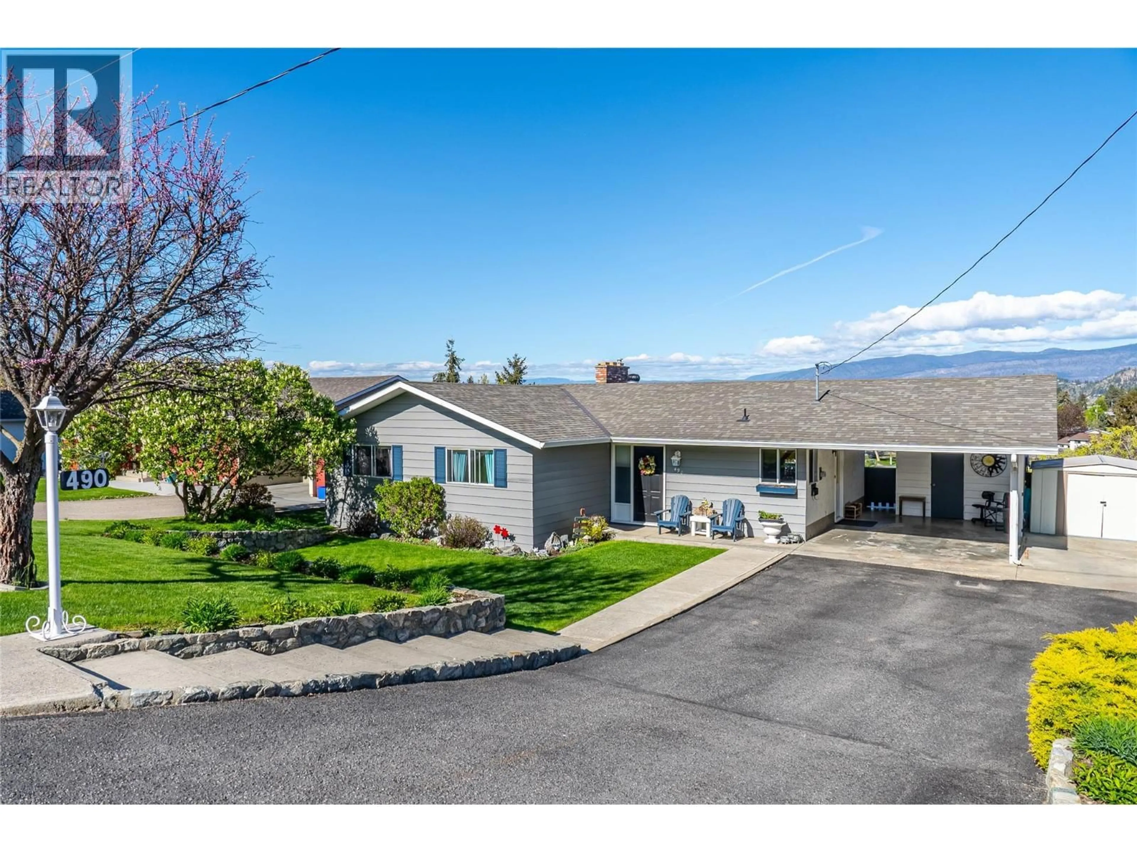 A pic from outside/outdoor area/front of a property/back of a property/a pic from drone, street for 490 SEAFORD ROAD, Kelowna British Columbia V1X5L4