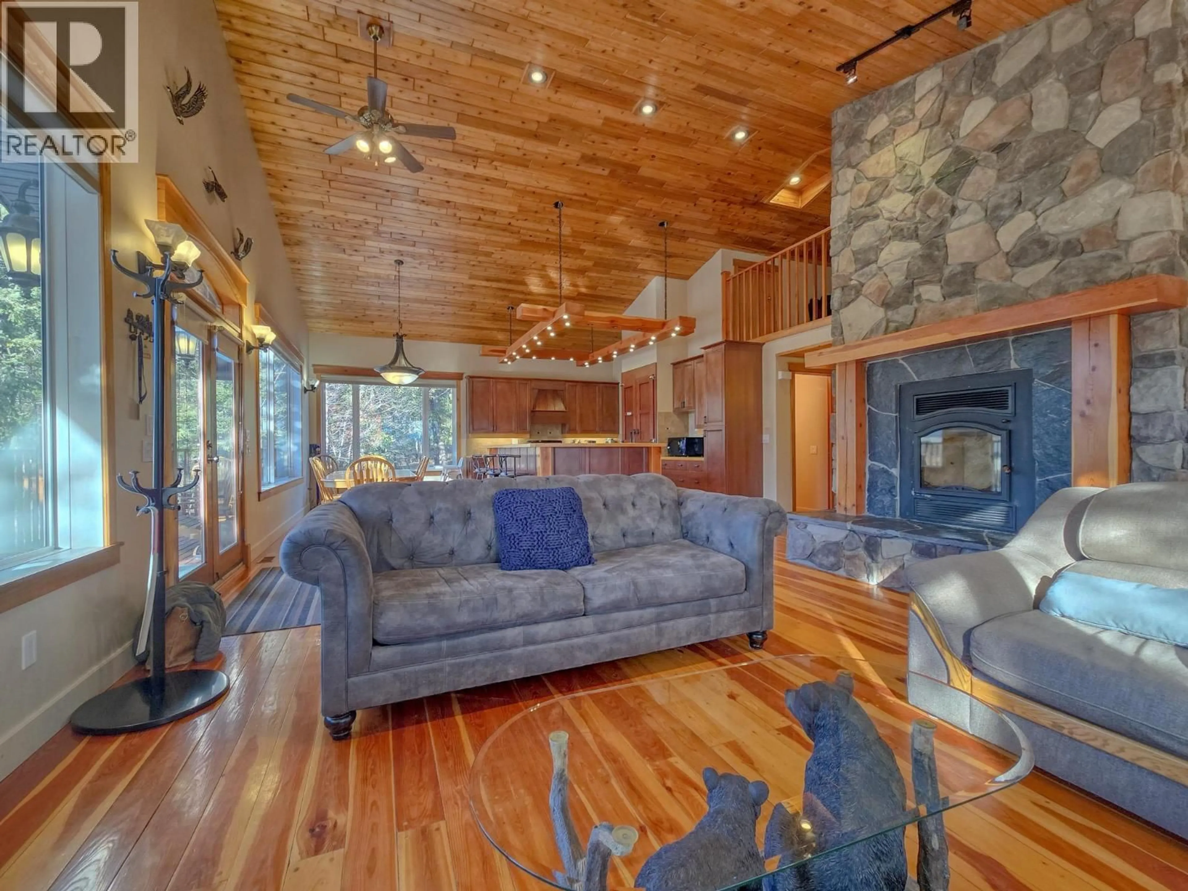 Living room with furniture, wood/laminate floor for 4980 TIMBERSIDE PLACE, Windermere British Columbia v0a1k3