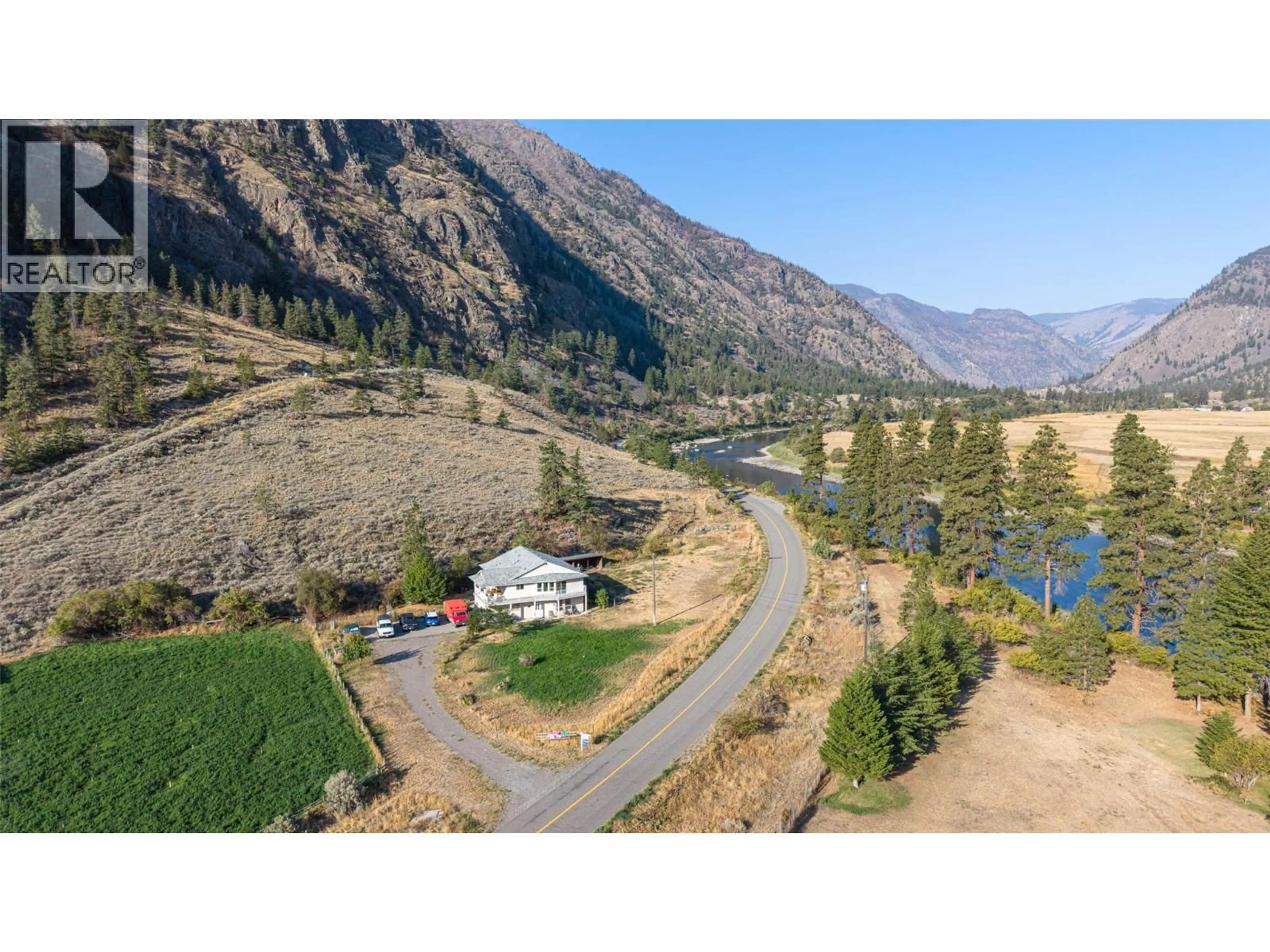A pic from outside/outdoor area/front of a property/back of a property/a pic from drone, mountain view for 205 ASHNOLA ROAD, Keremeos British Columbia V0X1N1