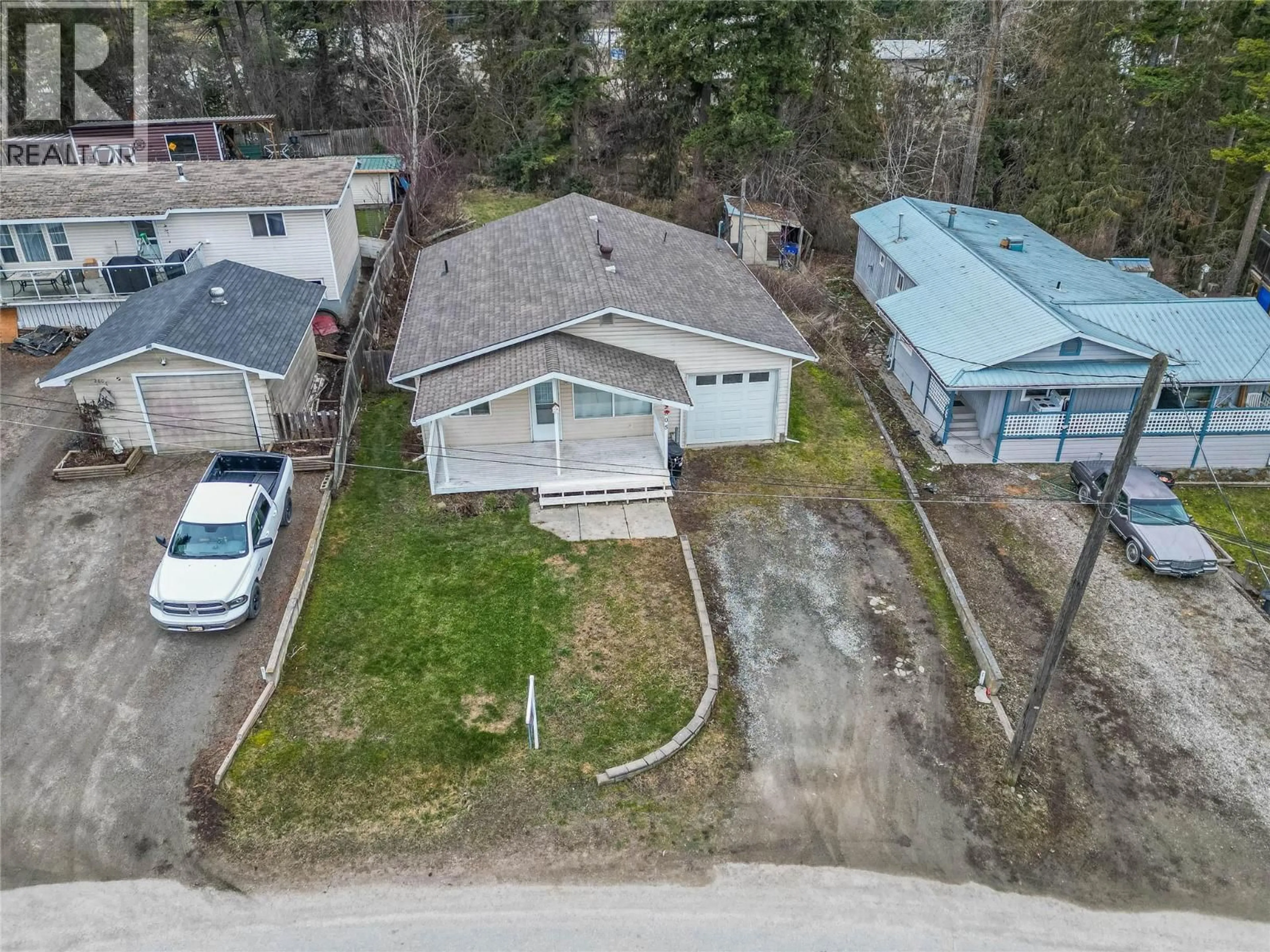 A pic from outside/outdoor area/front of a property/back of a property/a pic from drone, street for 2805 CAEN ROAD, Sorrento British Columbia V0E2W0
