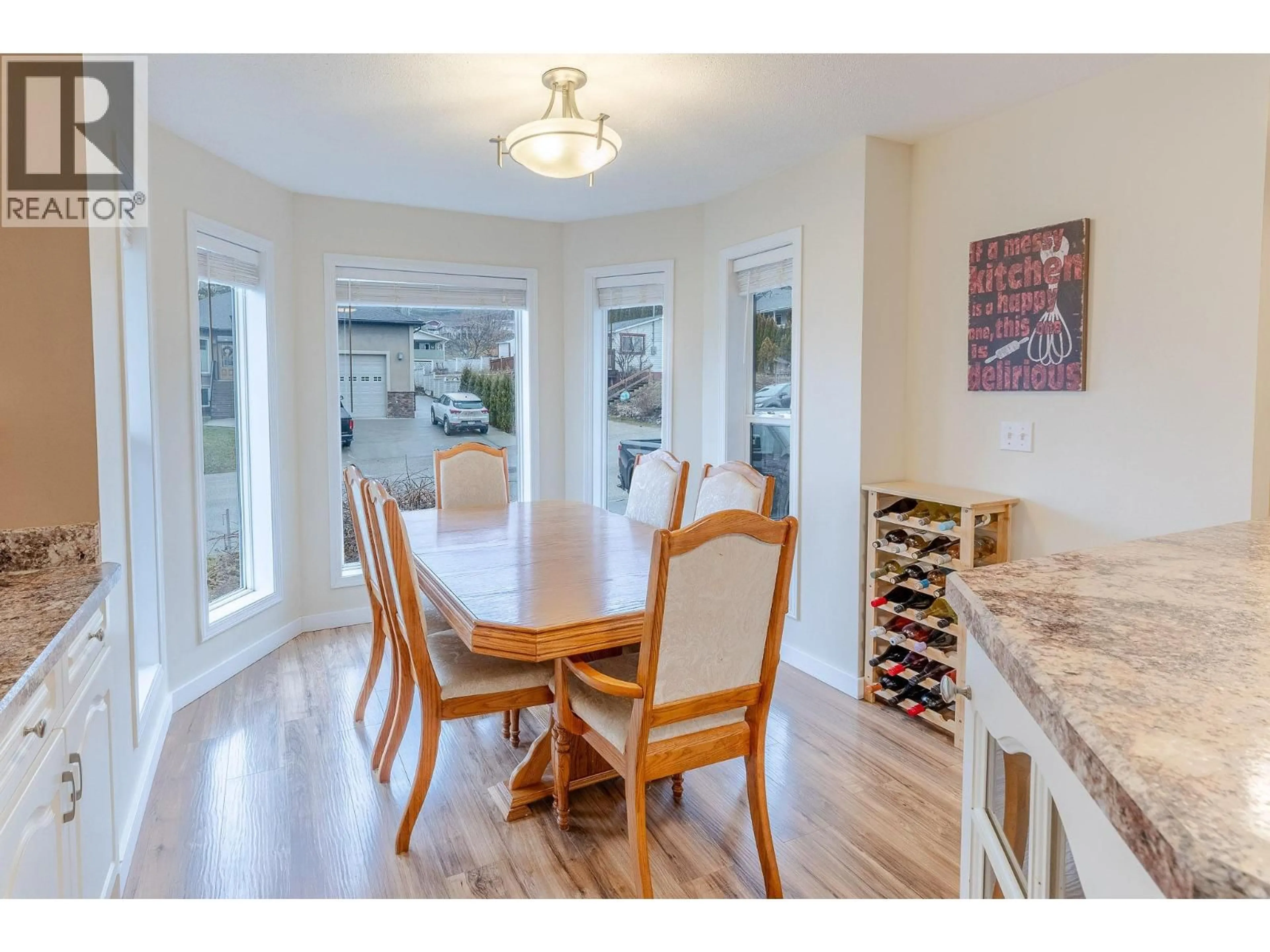 Dining room, wood/laminate floor for 1603 MURDOCH STREET, Creston British Columbia V0B1G5
