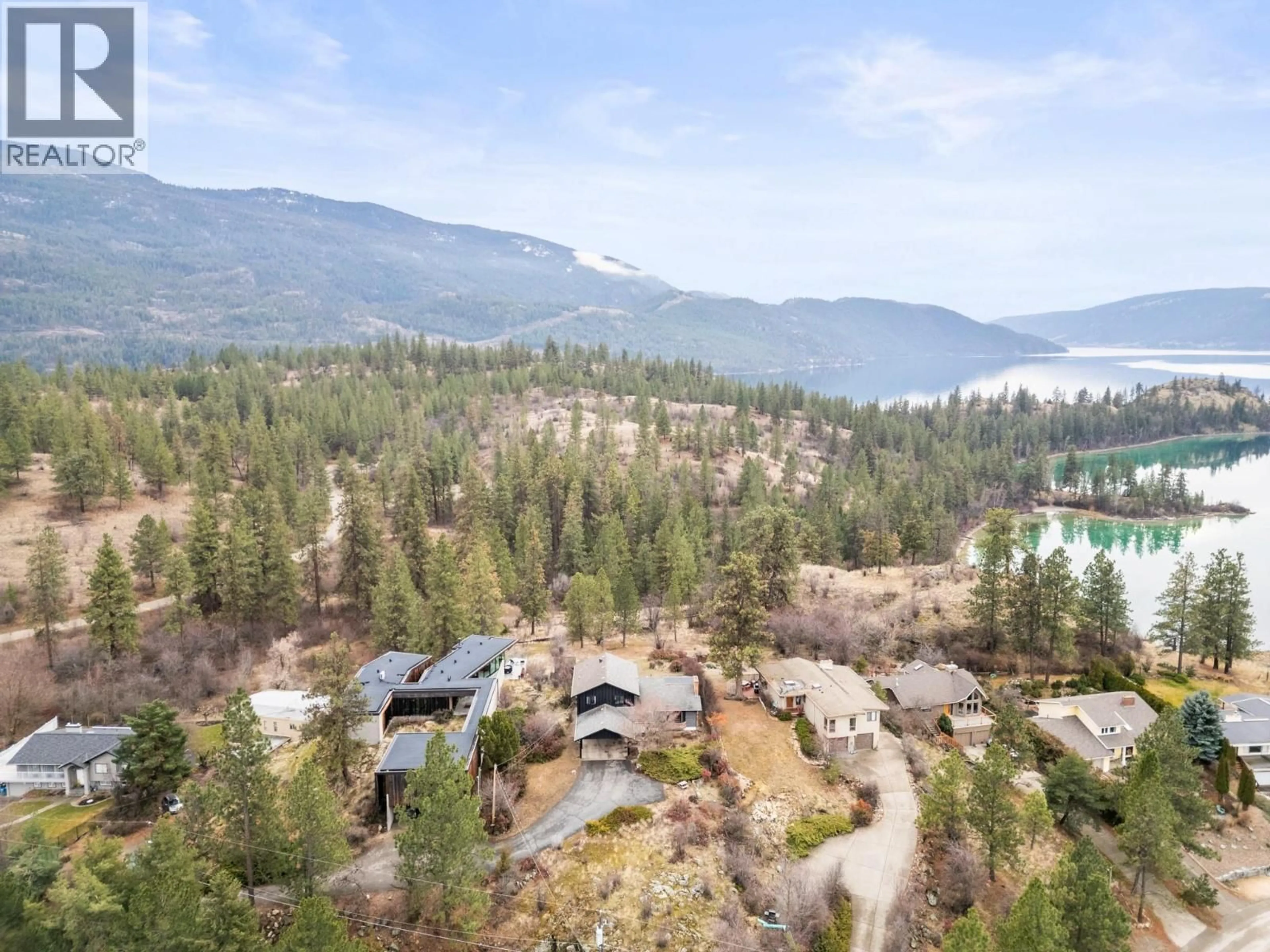 A pic from outside/outdoor area/front of a property/back of a property/a pic from drone, mountain view for 13501 SUMAC LANE, Coldstream British Columbia V1B1A1