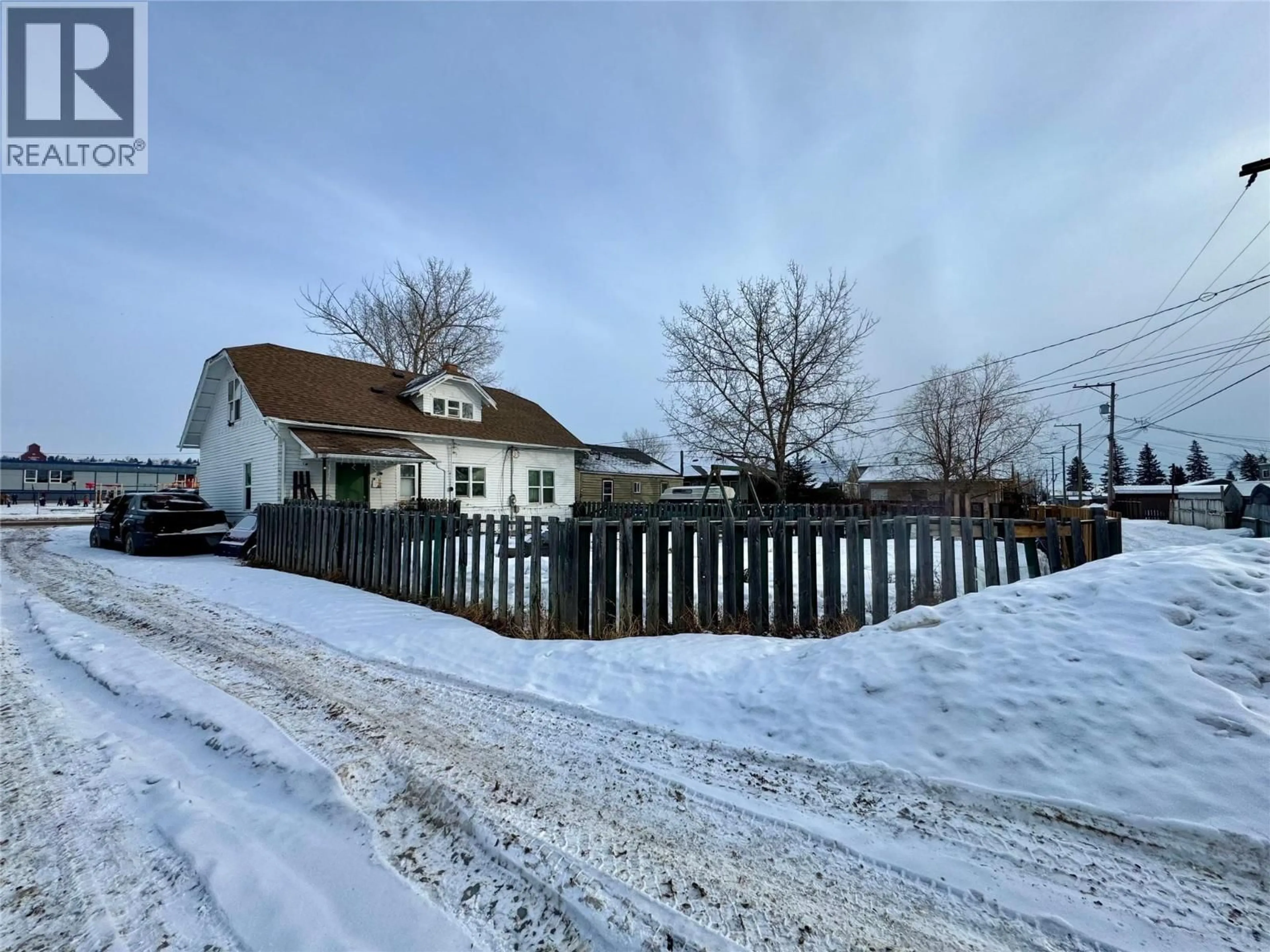 A pic from outside/outdoor area/front of a property/back of a property/a pic from drone, street for 925 105 AVENUE, Dawson Creek British Columbia V1G2L2