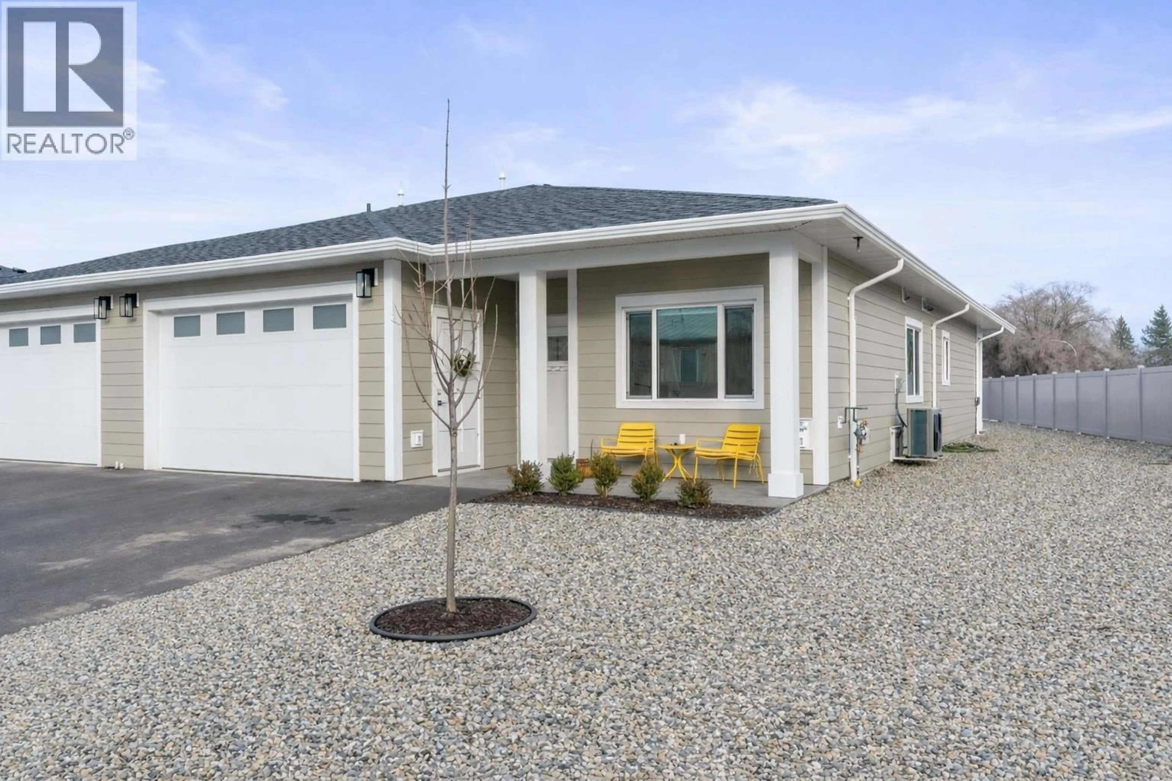 Home with vinyl exterior material, street for 6457 OKANAGAN LANDING ROAD, Vernon British Columbia V1H1M5