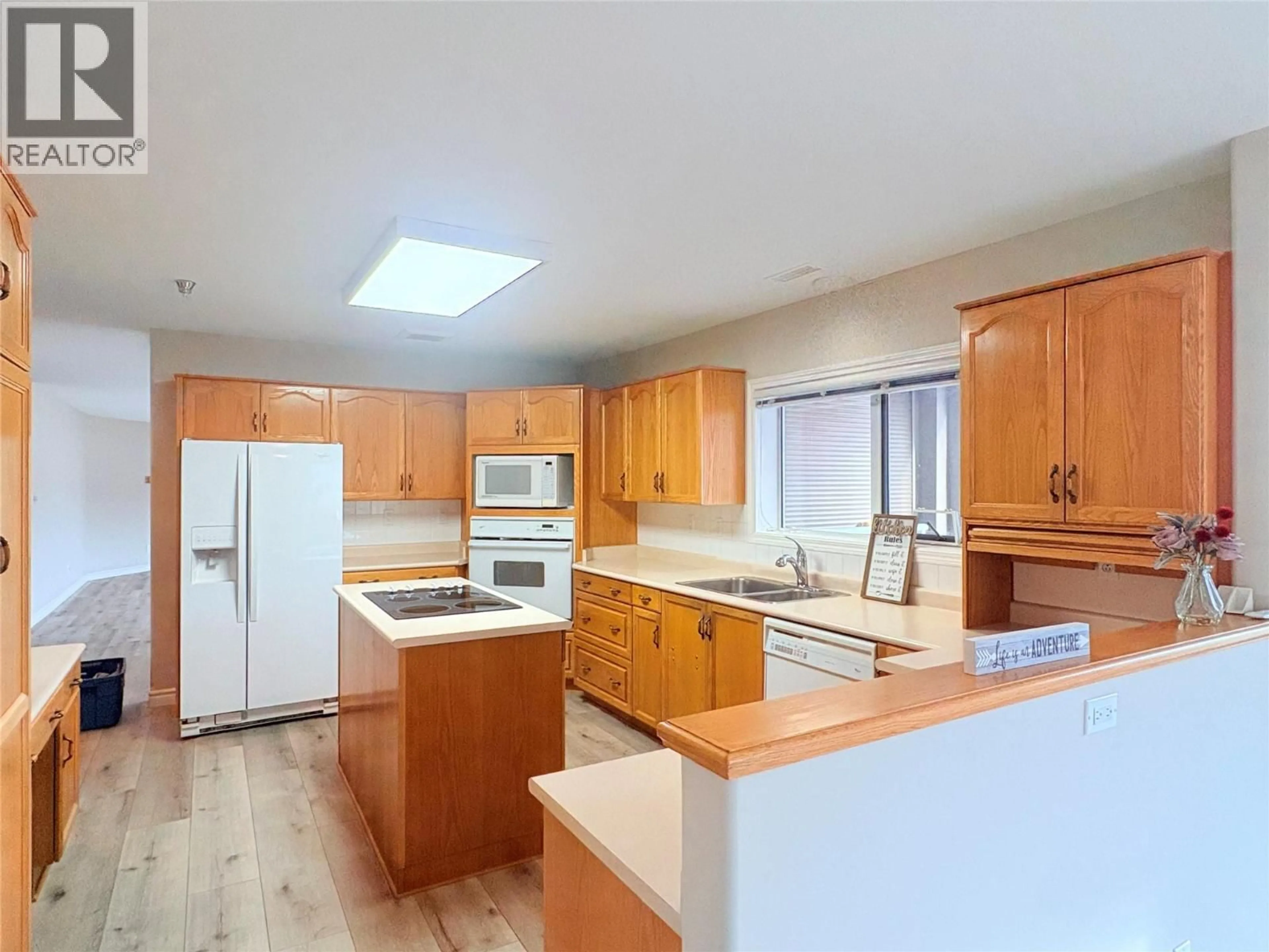 Open concept kitchen, unknown for 704 - 2245 ATKINSON STREET, Penticton British Columbia V2A8R7