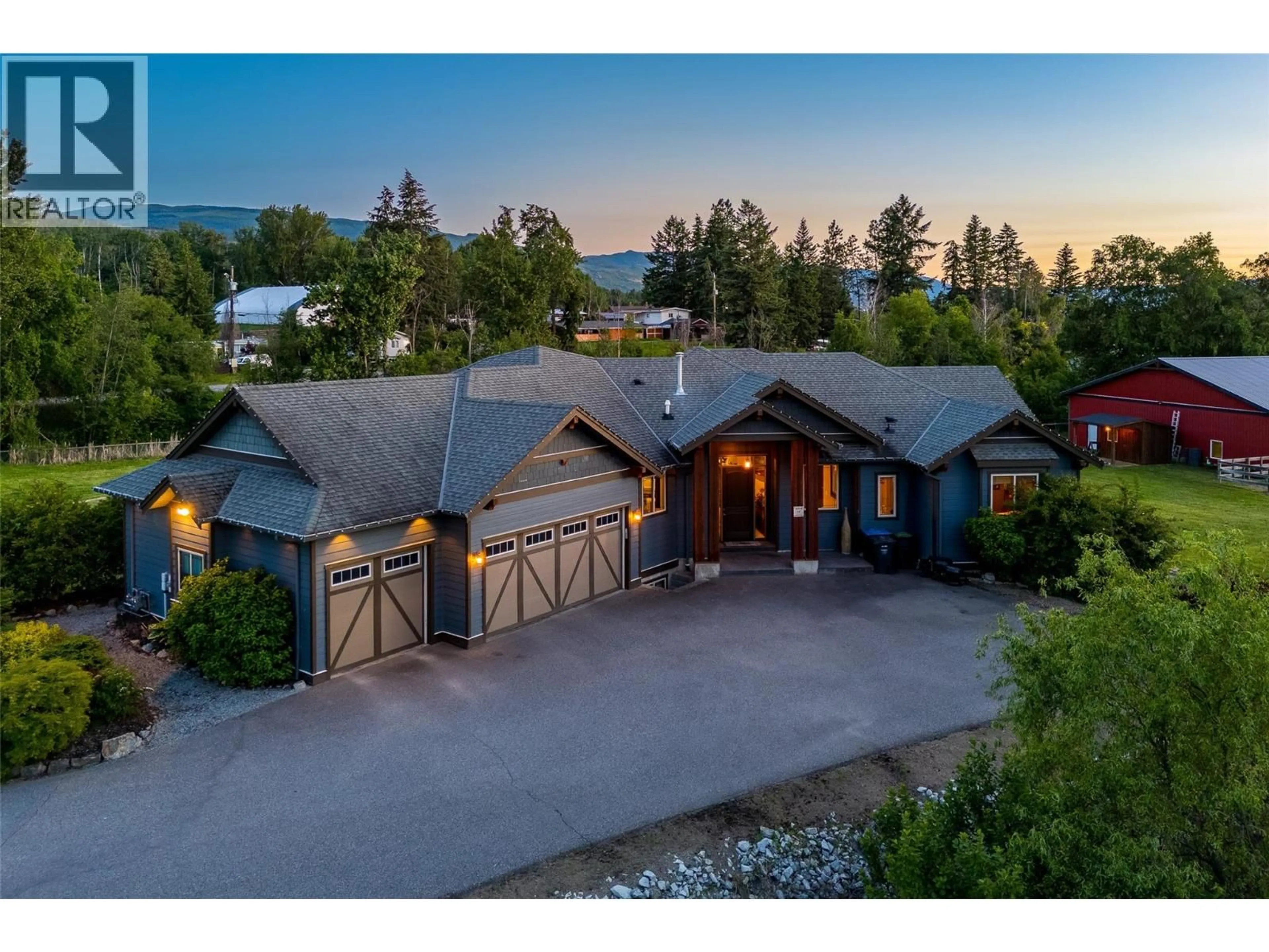 A pic from outside/outdoor area/front of a property/back of a property/a pic from drone, mountain view for 4284 JAUD ROAD, Kelowna British Columbia V1W4C5