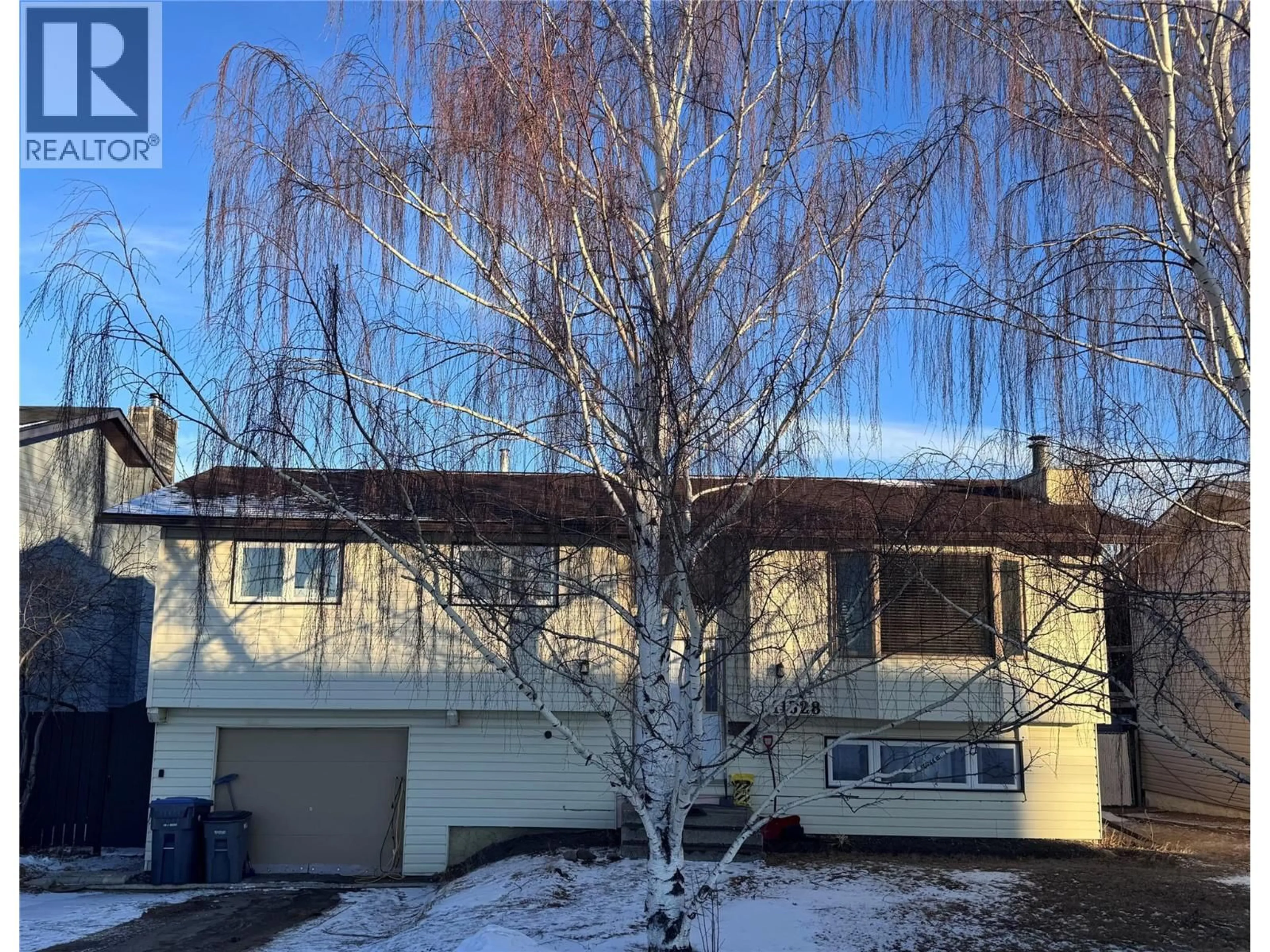 A pic from outside/outdoor area/front of a property/back of a property/a pic from drone, street for 11328 17 STREET, Dawson Creek British Columbia V1G4J5