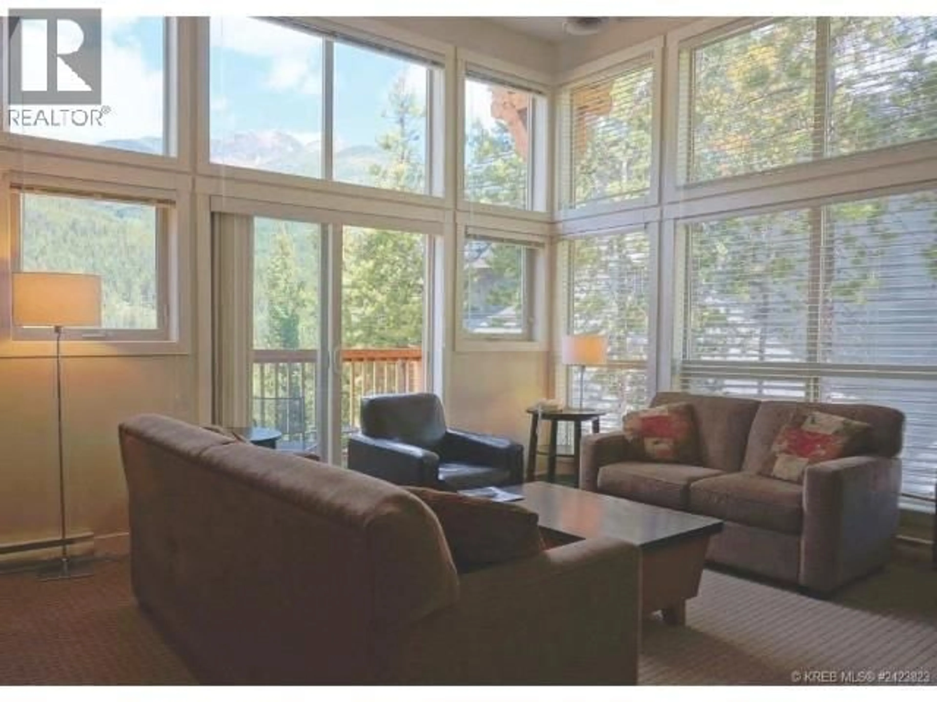 Living room with furniture, wood/laminate floor for 226C - 2049 SUMMIT DRIVE, Panorama British Columbia V0A1T0