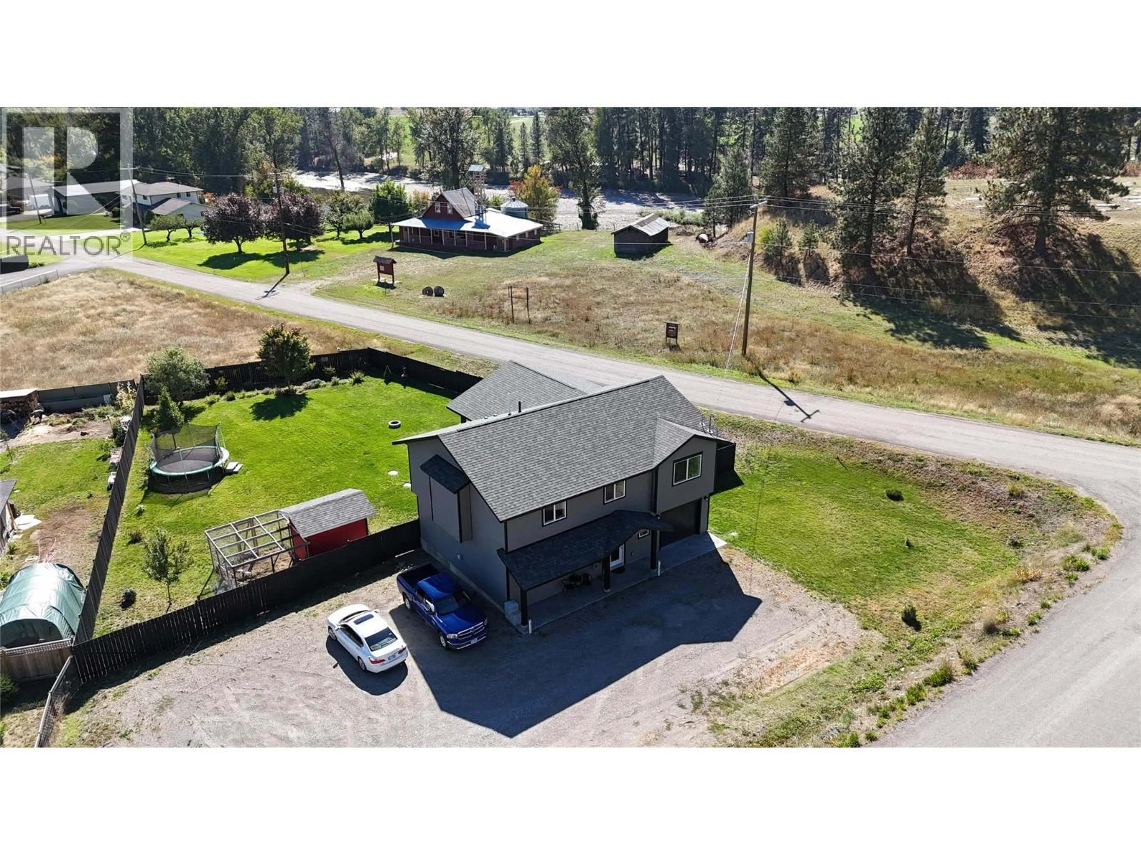 A pic from outside/outdoor area/front of a property/back of a property/a pic from drone, unknown for 3600 HALL FRONTAGE ROAD, Grand Forks British Columbia V0H1H5