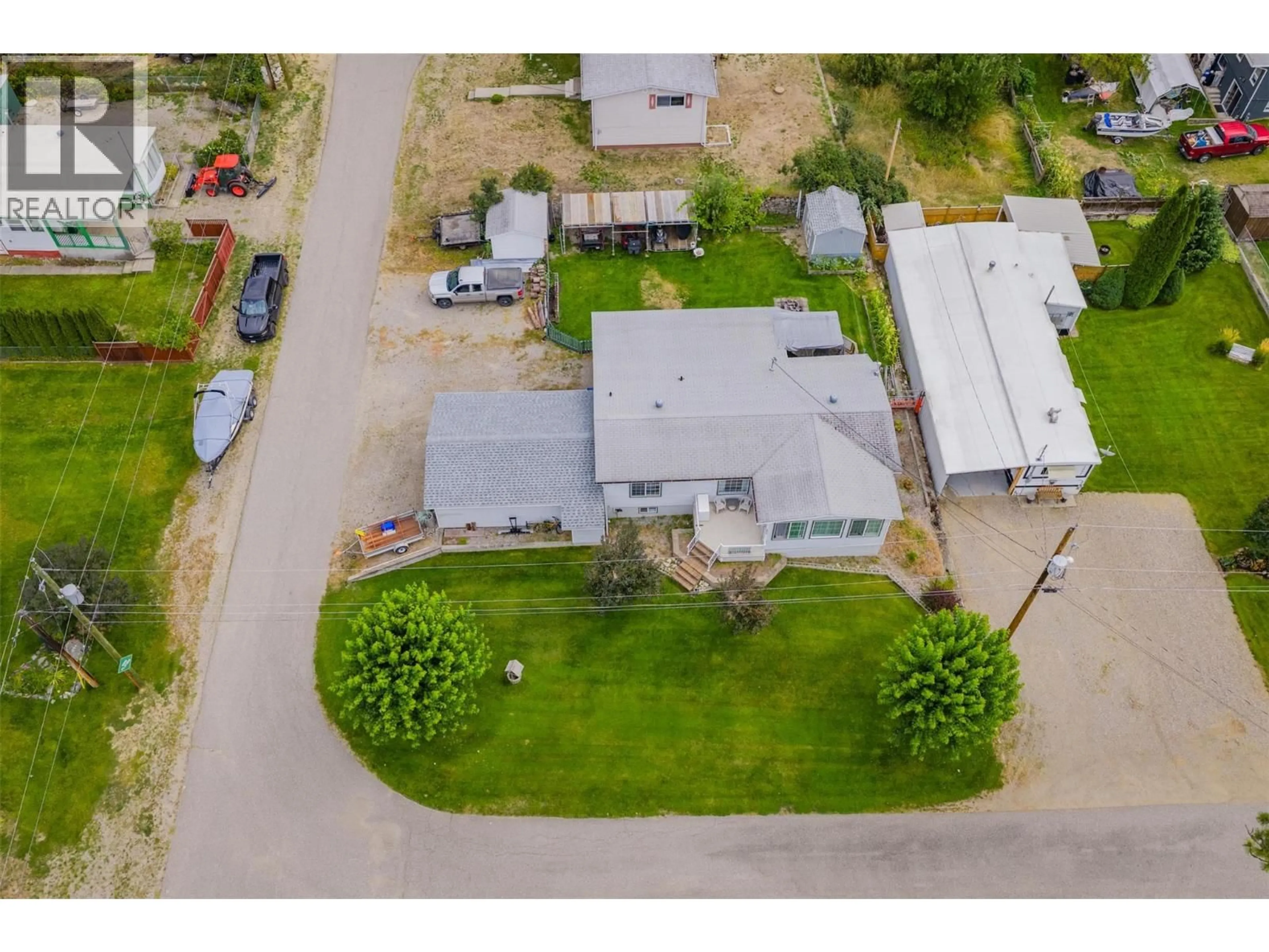 A pic from outside/outdoor area/front of a property/back of a property/a pic from drone, street for 1664 MAIDA ROAD, Christina Lake British Columbia V0H1E3