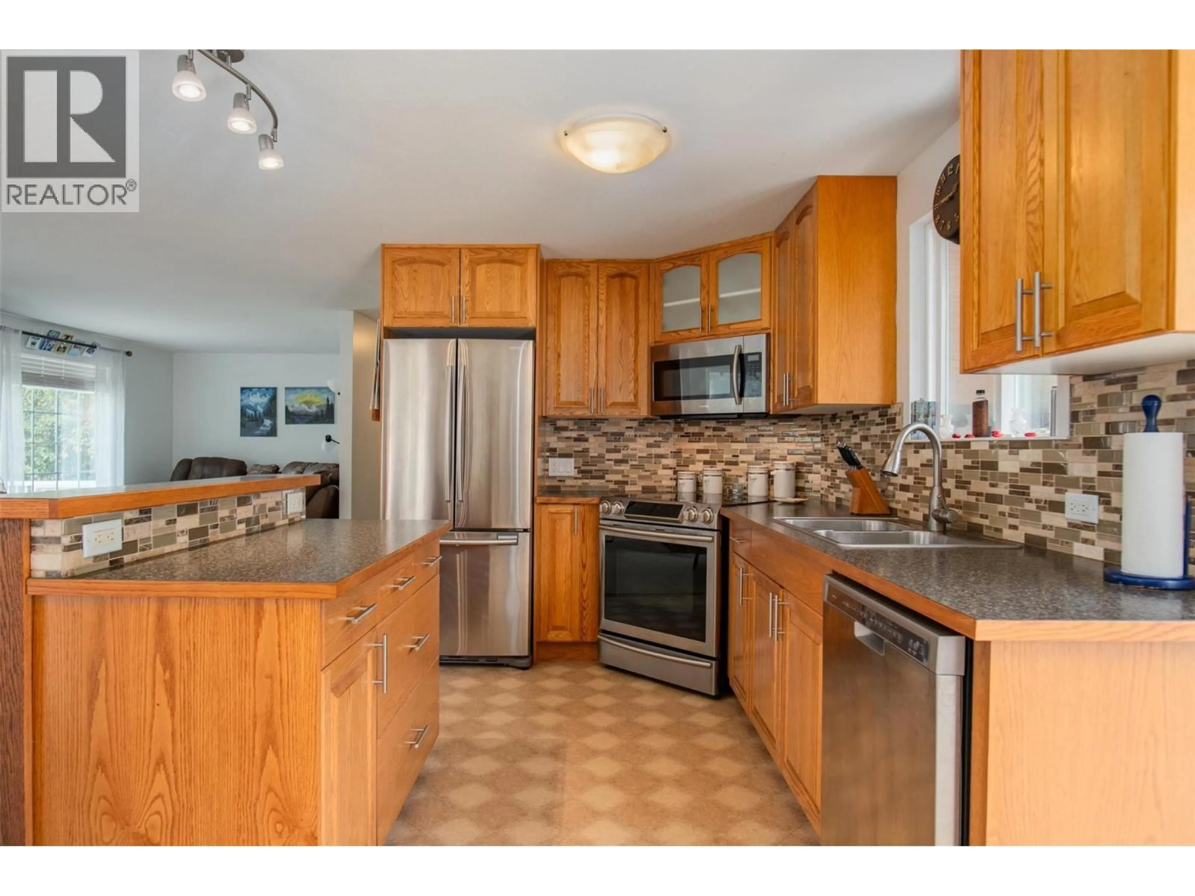 Open concept kitchen, ceramic/tile floor for 1664 MAIDA ROAD, Christina Lake British Columbia V0H1E3