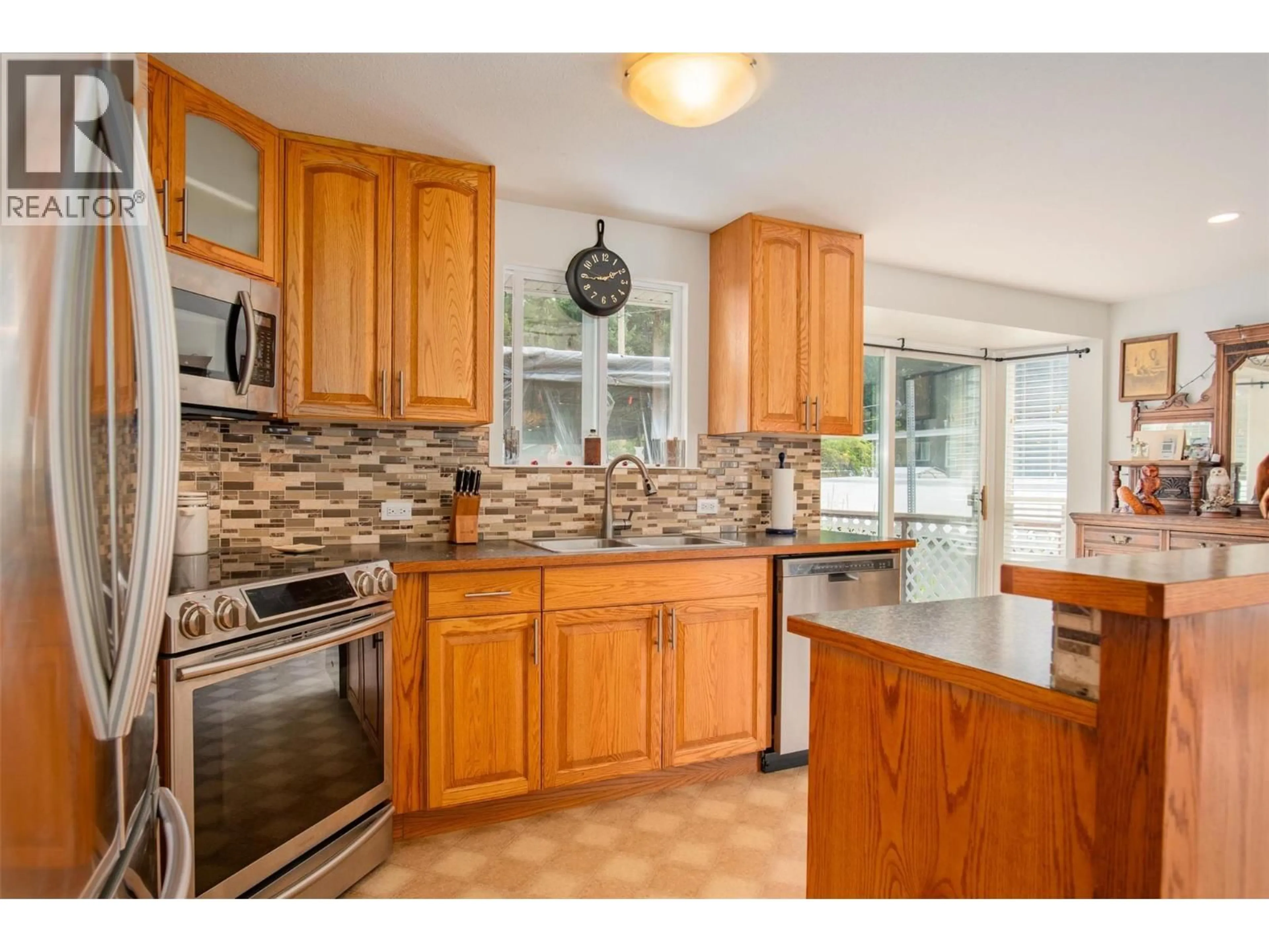Open concept kitchen, ceramic/tile floor for 1664 MAIDA ROAD, Christina Lake British Columbia V0H1E3
