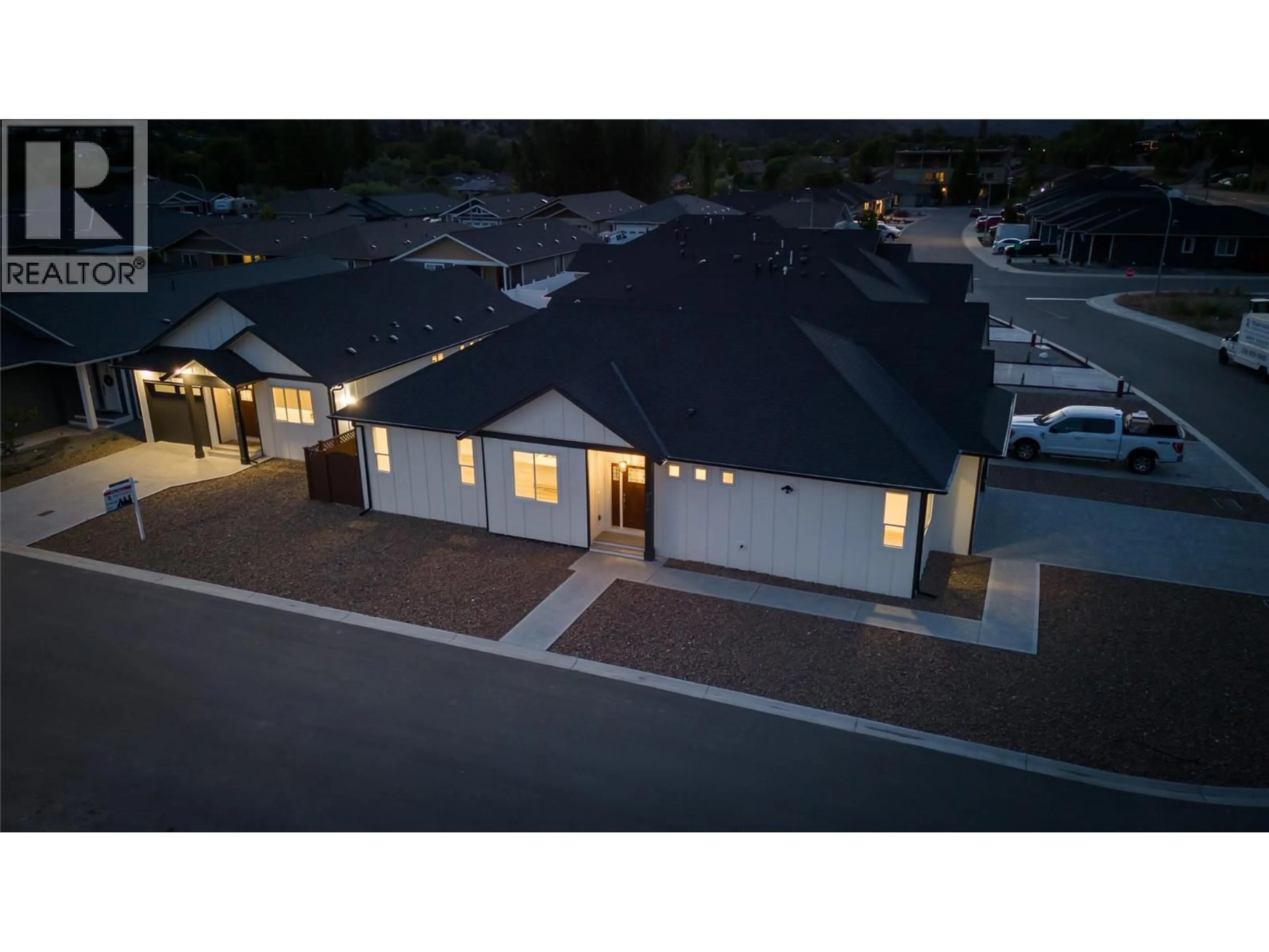 A pic from outside/outdoor area/front of a property/back of a property/a pic from drone, street for 258 BENTGRASS AVENUE, Oliver British Columbia V0H1T3