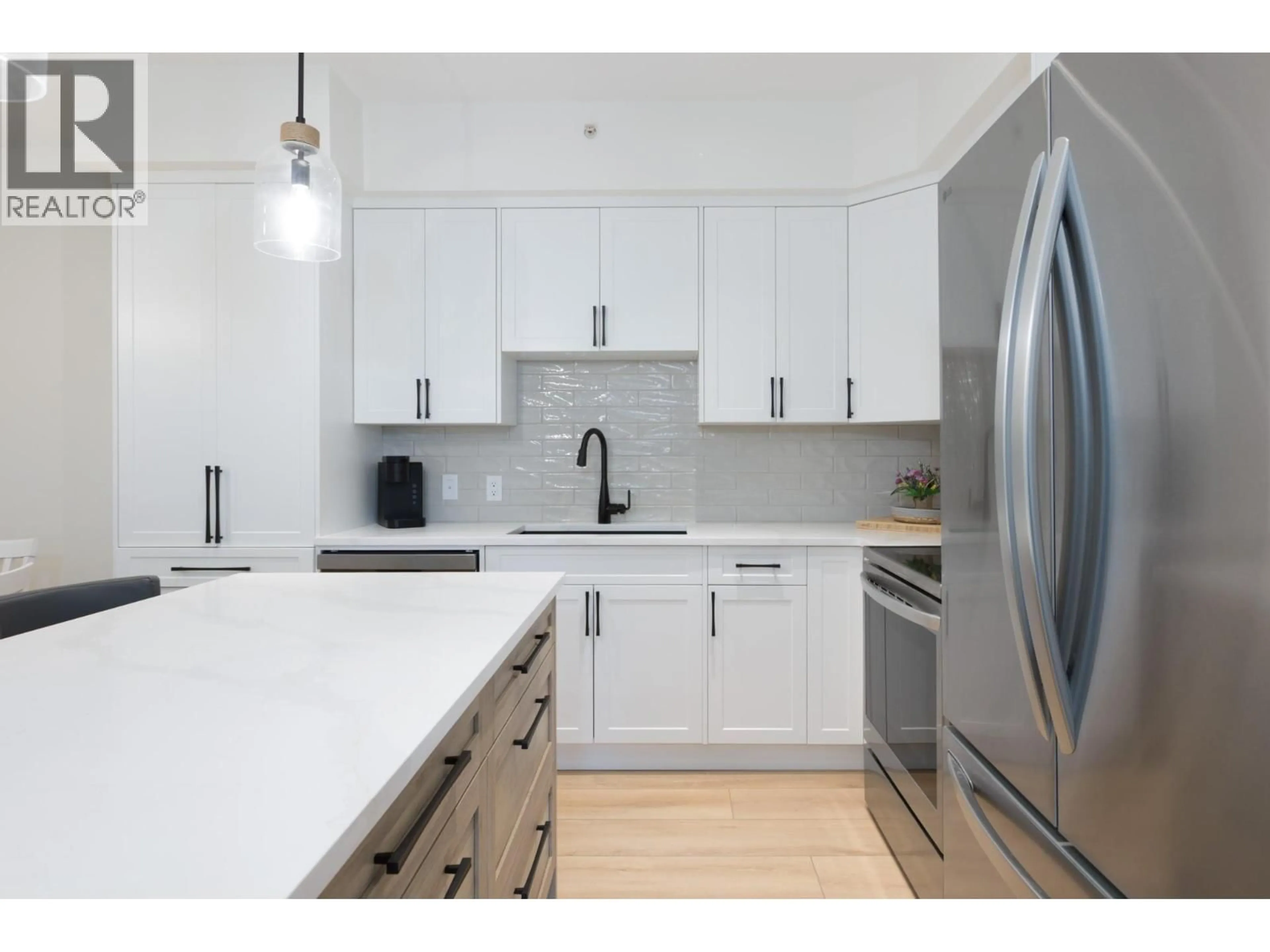 Open concept kitchen, unknown for 400 - 680 LEQUIME ROAD, Kelowna British Columbia V1A1A4