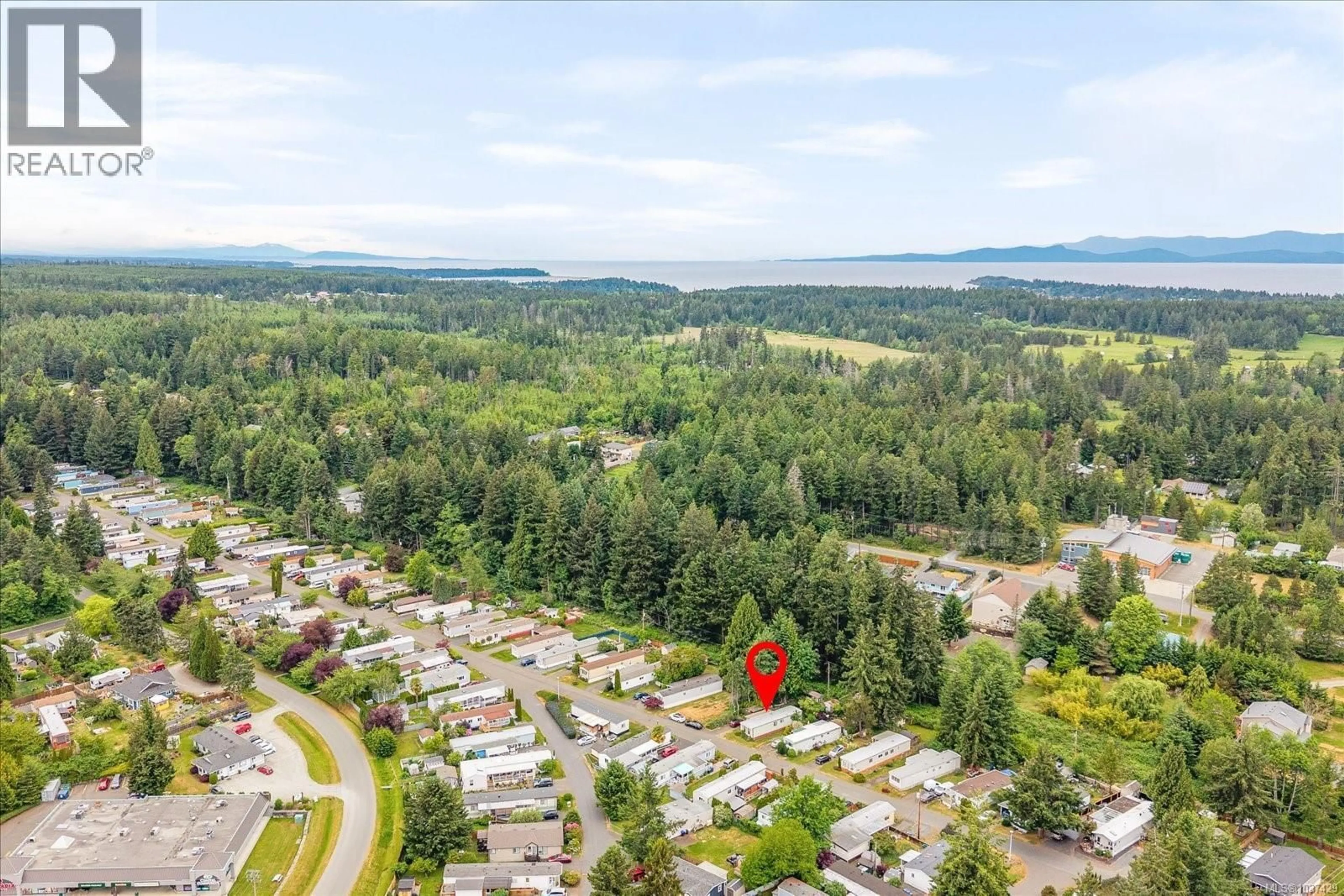 A pic from outside/outdoor area/front of a property/back of a property/a pic from drone, forest/trees view for 283 - 2465 APOLLO DRIVE, Nanoose Bay British Columbia V9P9K2