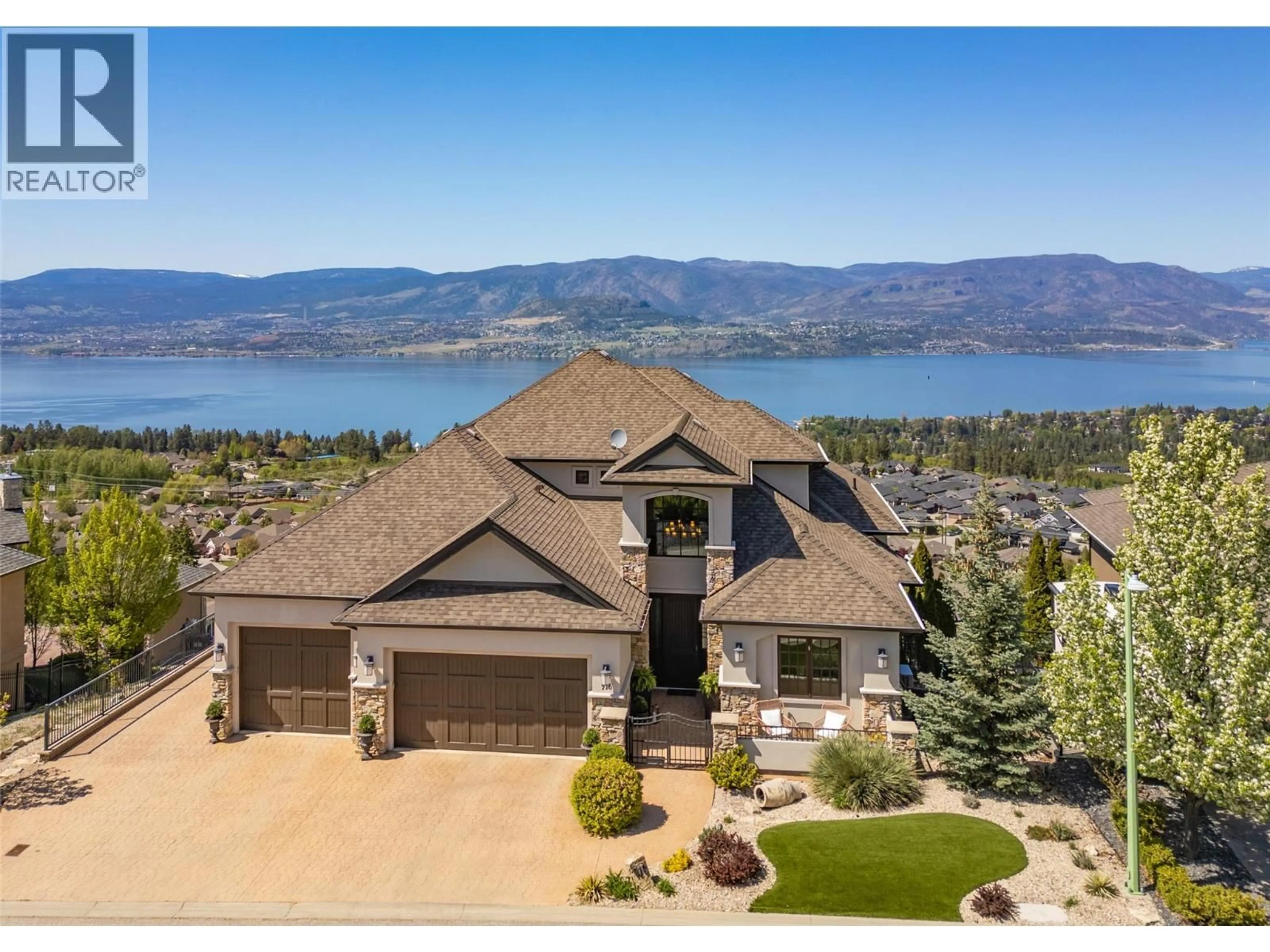 A pic from outside/outdoor area/front of a property/back of a property/a pic from drone, water/lake/river/ocean view for 716 KUIPERS CRESCENT, Kelowna British Columbia V1W5B2