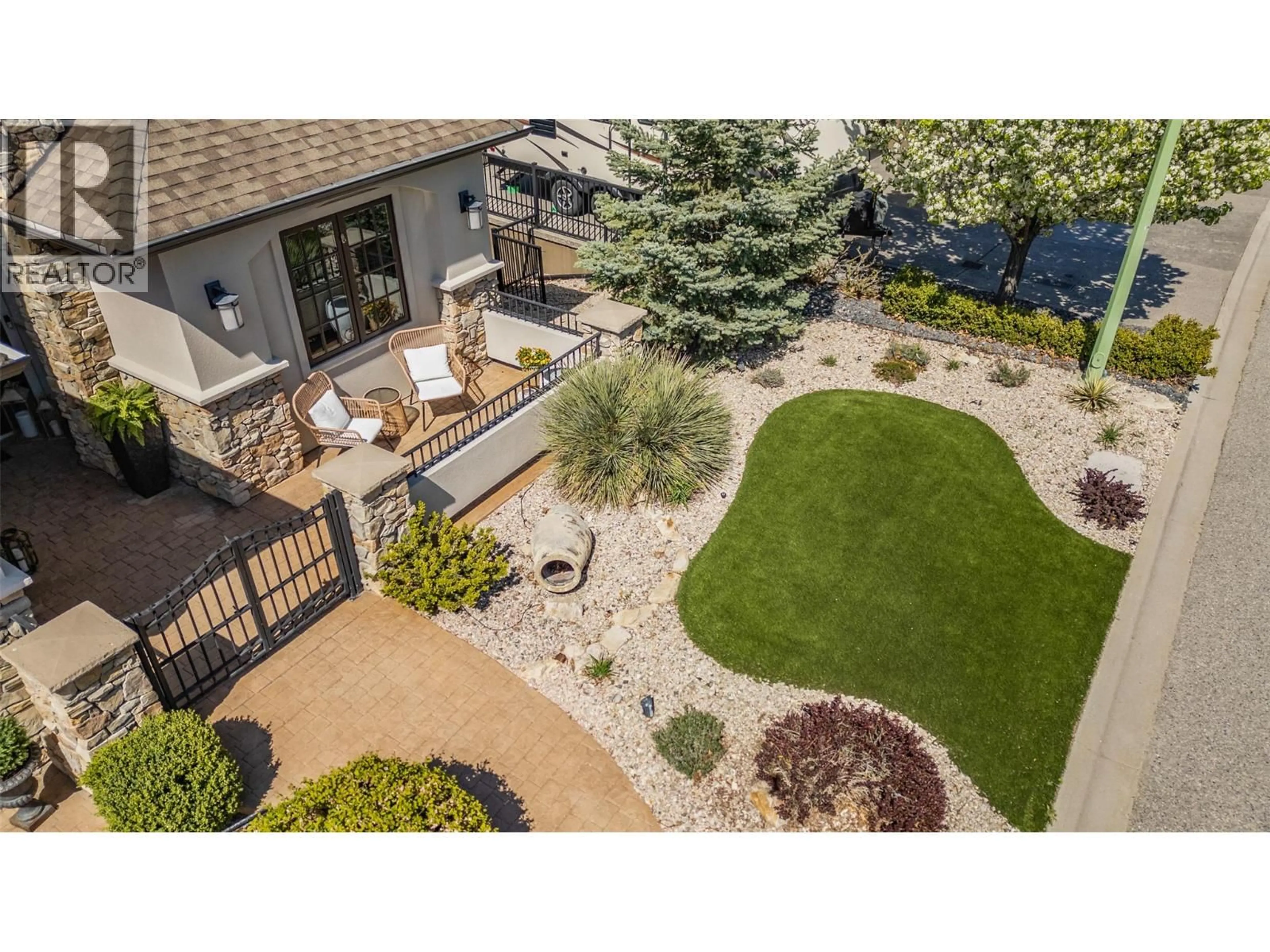 A pic from outside/outdoor area/front of a property/back of a property/a pic from drone, mountain view for 716 KUIPERS CRESCENT, Kelowna British Columbia V1W5B2