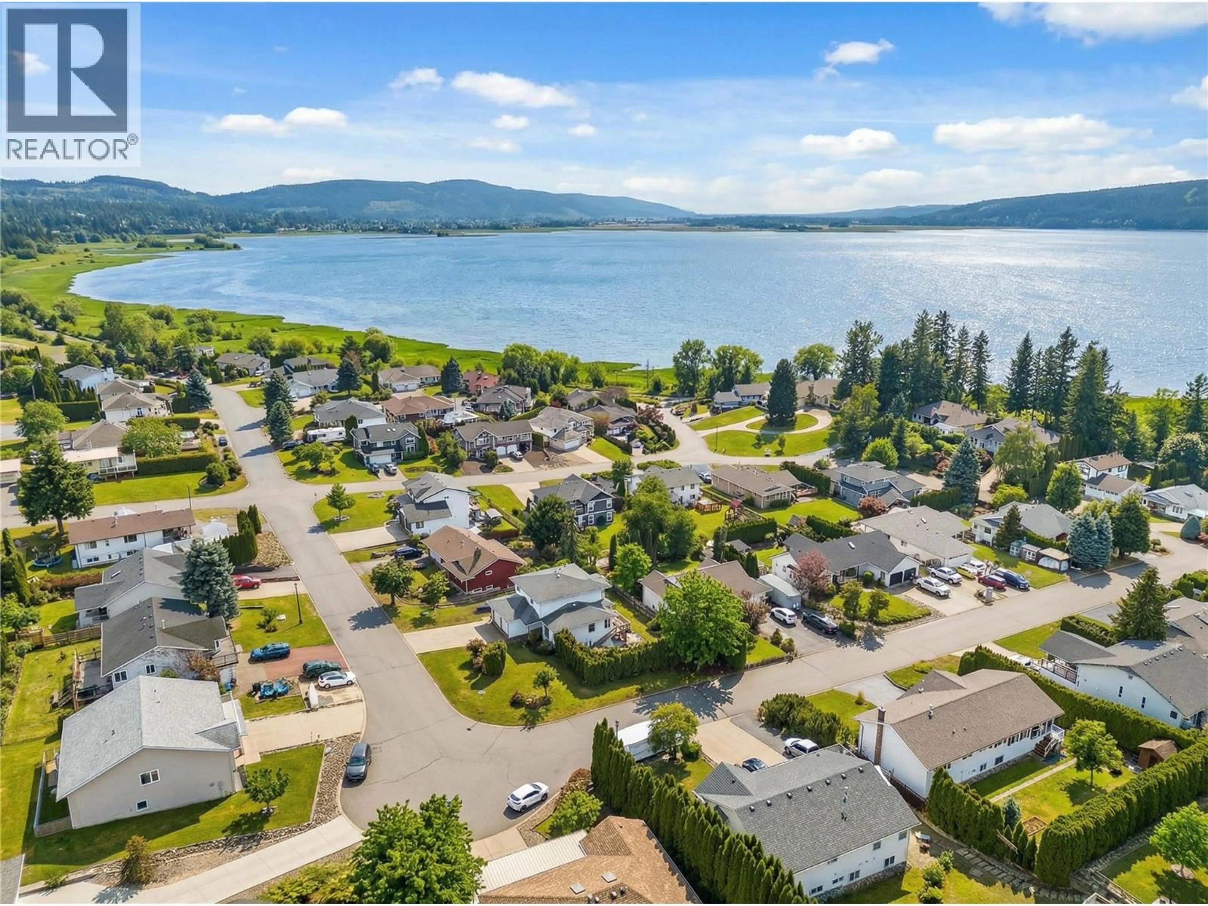 A pic from outside/outdoor area/front of a property/back of a property/a pic from drone, water/lake/river/ocean view for 4851 13 STREET NORTHEAST, Salmon Arm British Columbia V1E3P1