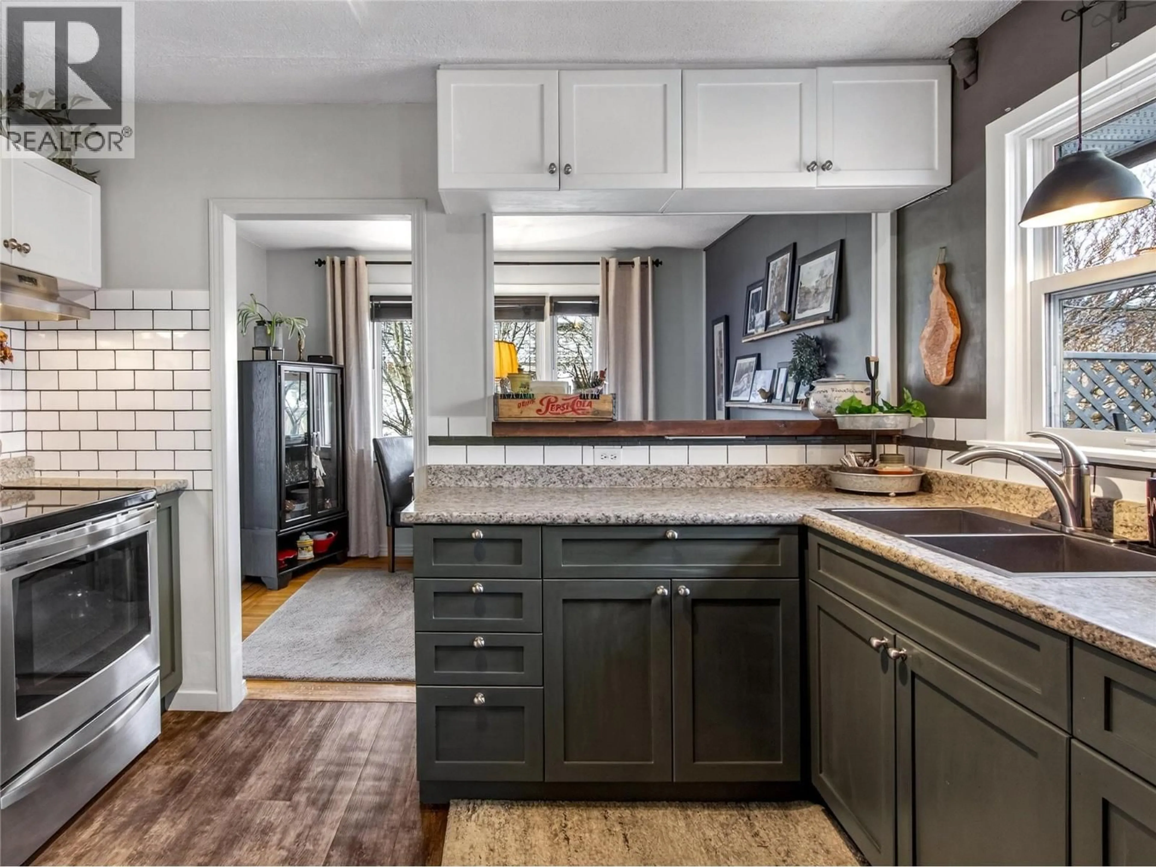 Open concept kitchen, ceramic/tile floor for 413 CONKLIN AVENUE, Penticton British Columbia V2A2T3