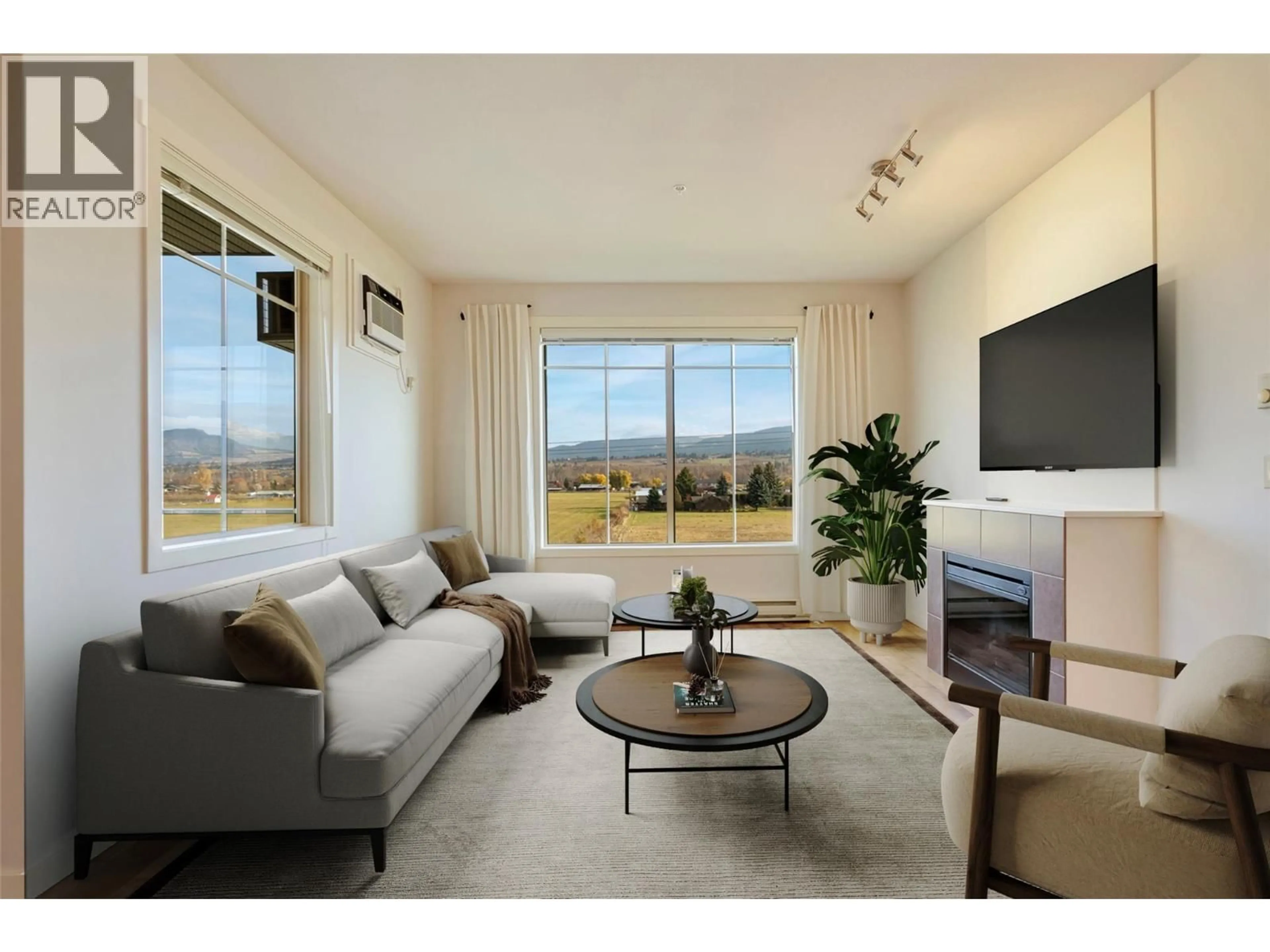 Living room with furniture, unknown for 313 - 3739 CASORSO ROAD, Kelowna British Columbia V1W5E8