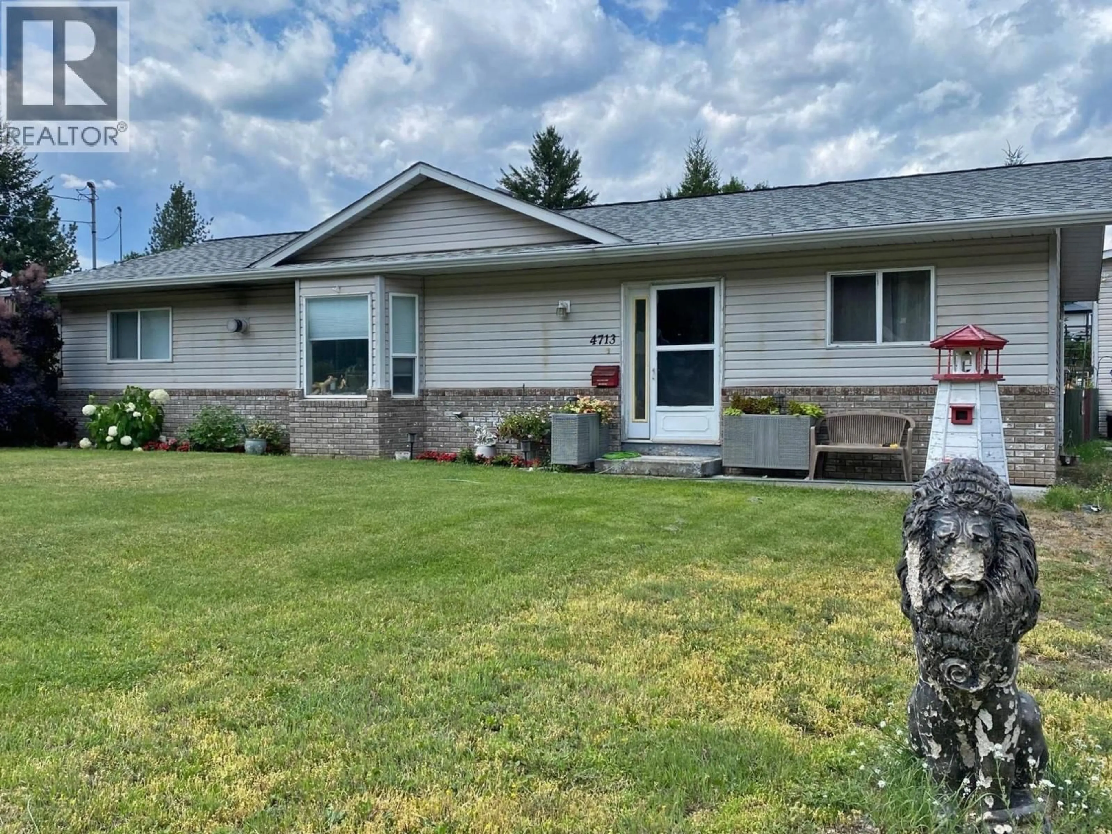 Home with vinyl exterior material, street for 4713 BIRCH LANE, Barriere British Columbia V0E1E0