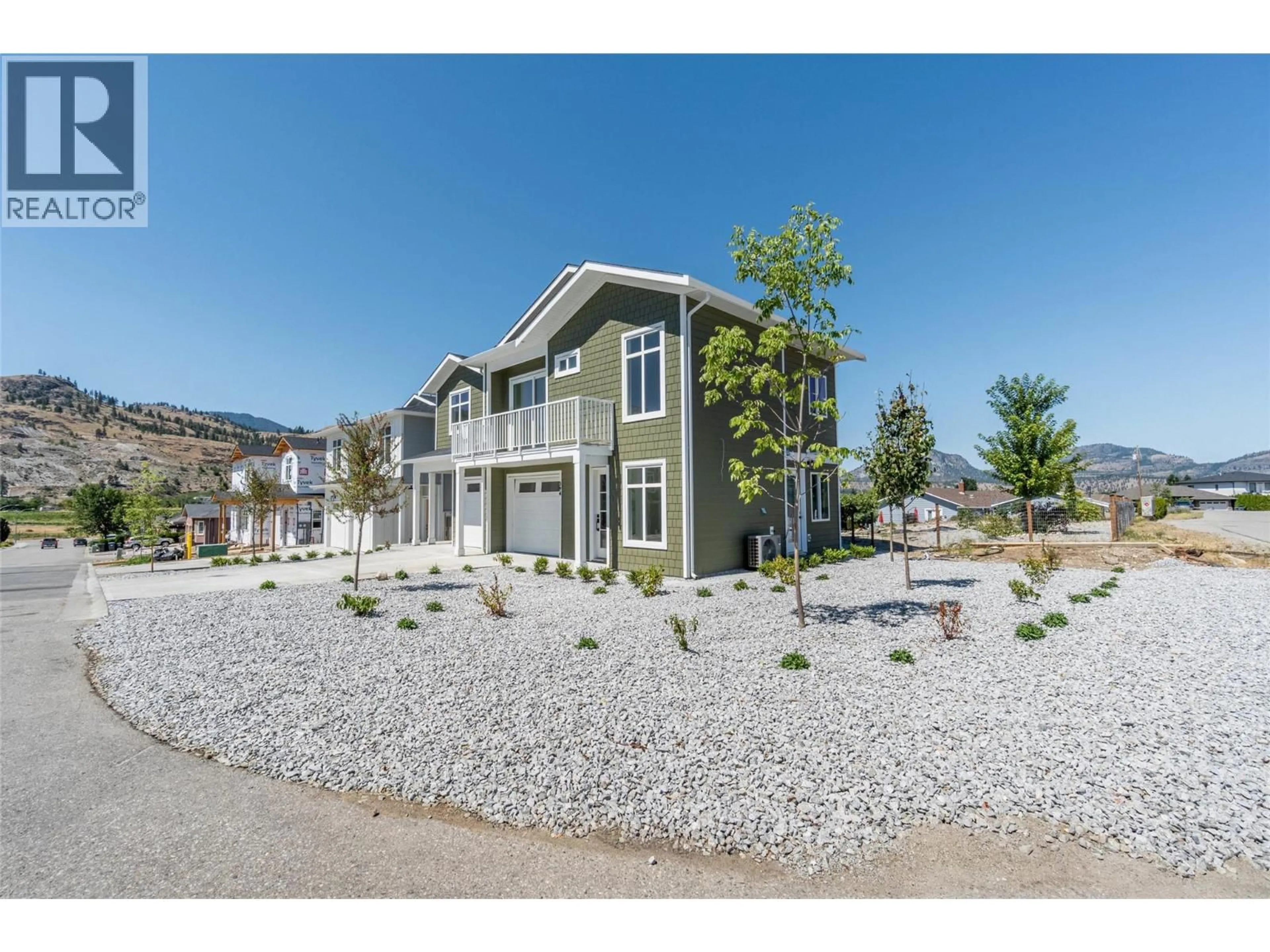 Home with vinyl exterior material, mountain view for 394 CHARDONNAY AVENUE, Oliver British Columbia V0H1T4