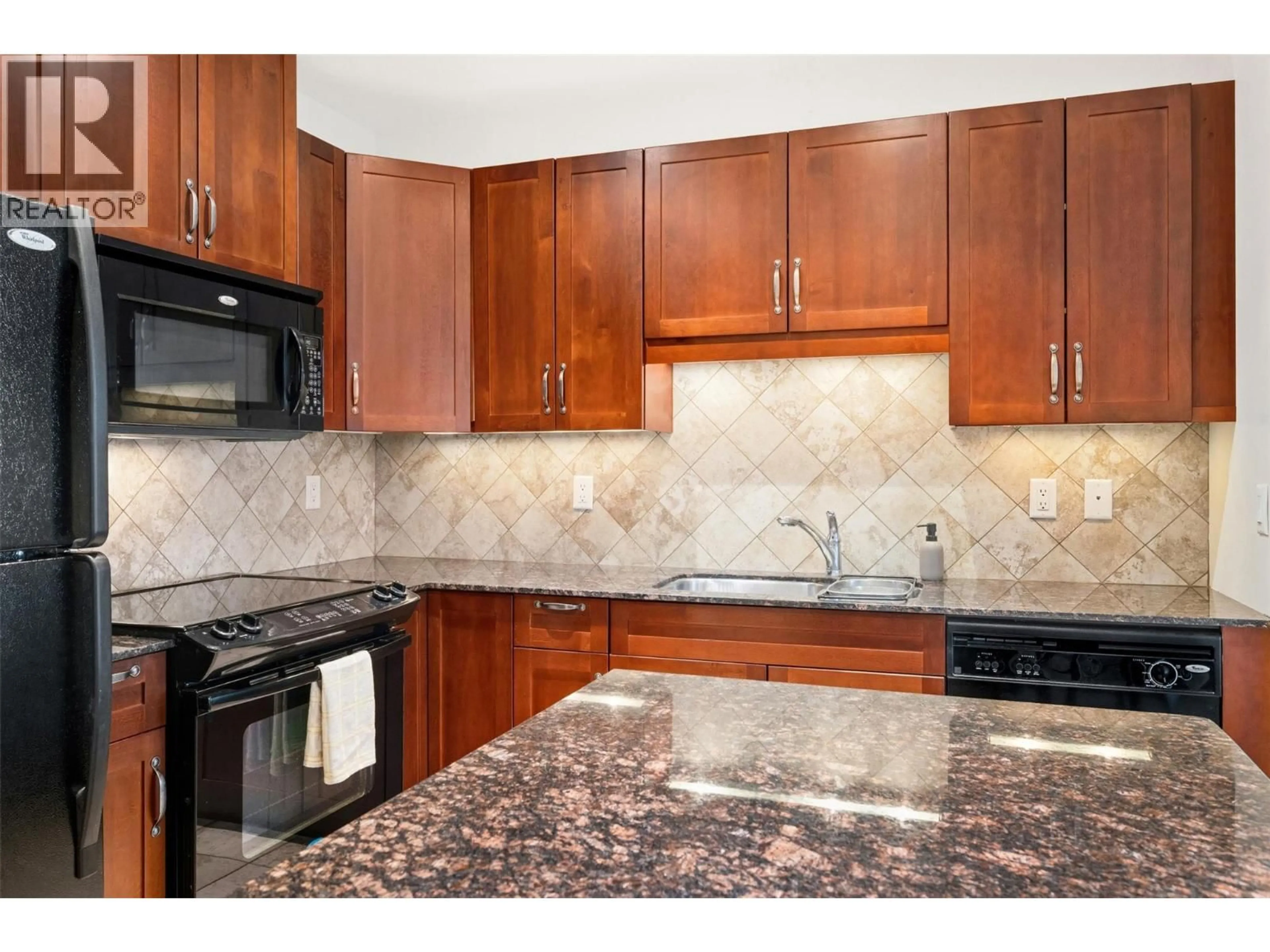Standard kitchen, ceramic/tile floor for 704 - 3301 SKAHA LAKE ROAD, Penticton British Columbia V2A6G6