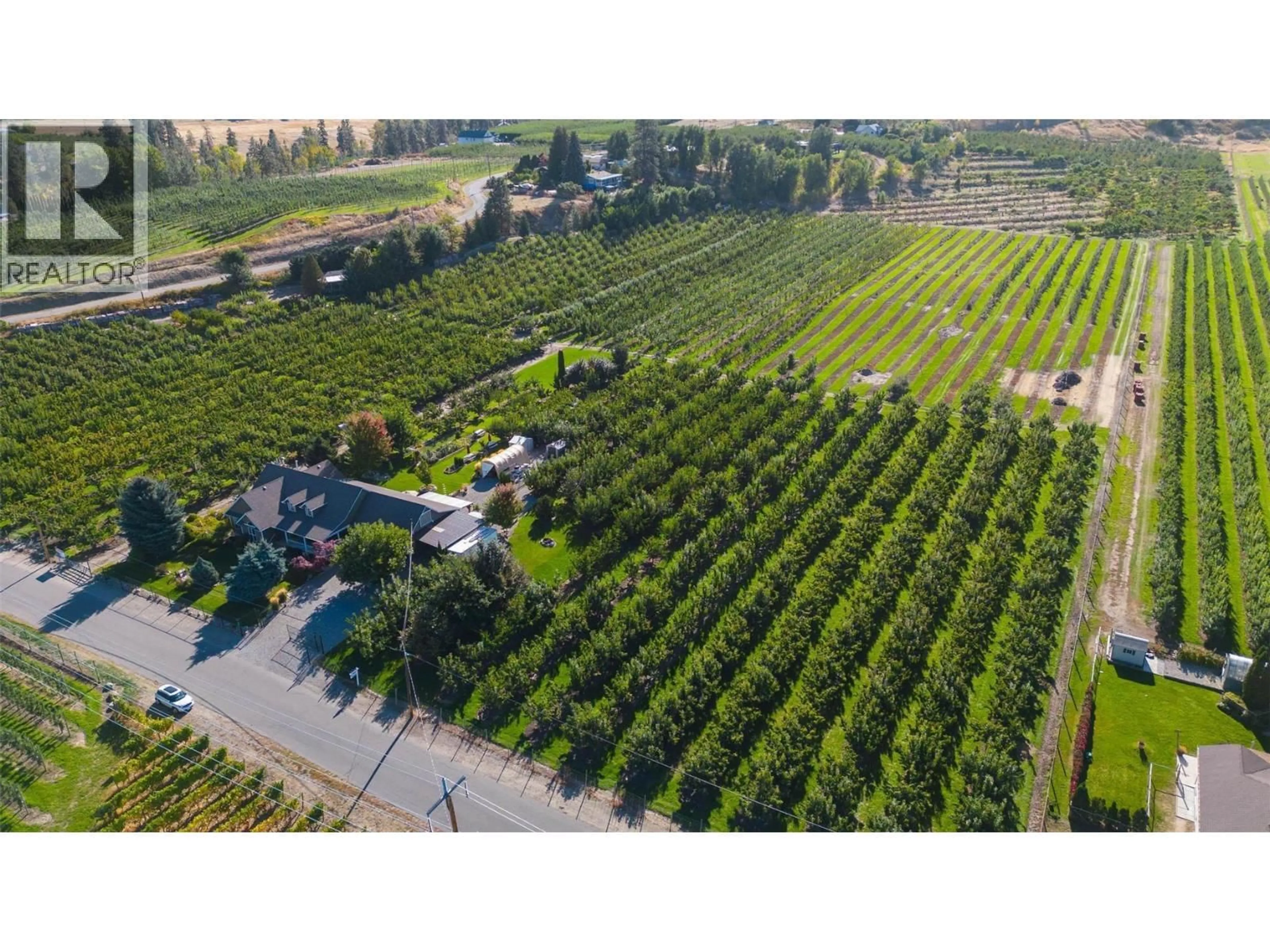 A pic from outside/outdoor area/front of a property/back of a property/a pic from drone, forest/trees view for TEASDALE ROAD, Kelowna British Columbia V1P1C8