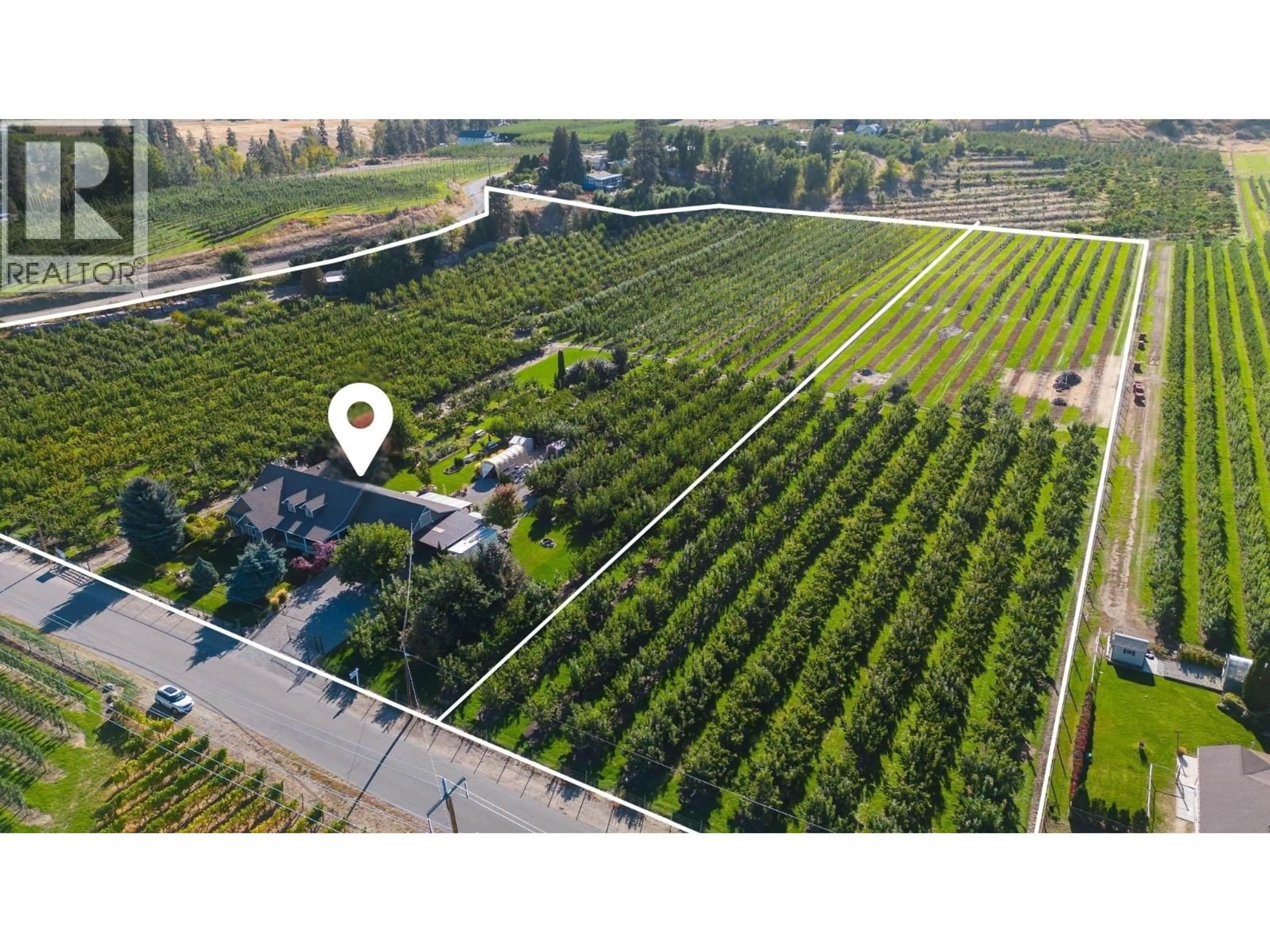 A pic from outside/outdoor area/front of a property/back of a property/a pic from drone, forest/trees view for TEASDALE ROAD, Kelowna British Columbia V1P1C8