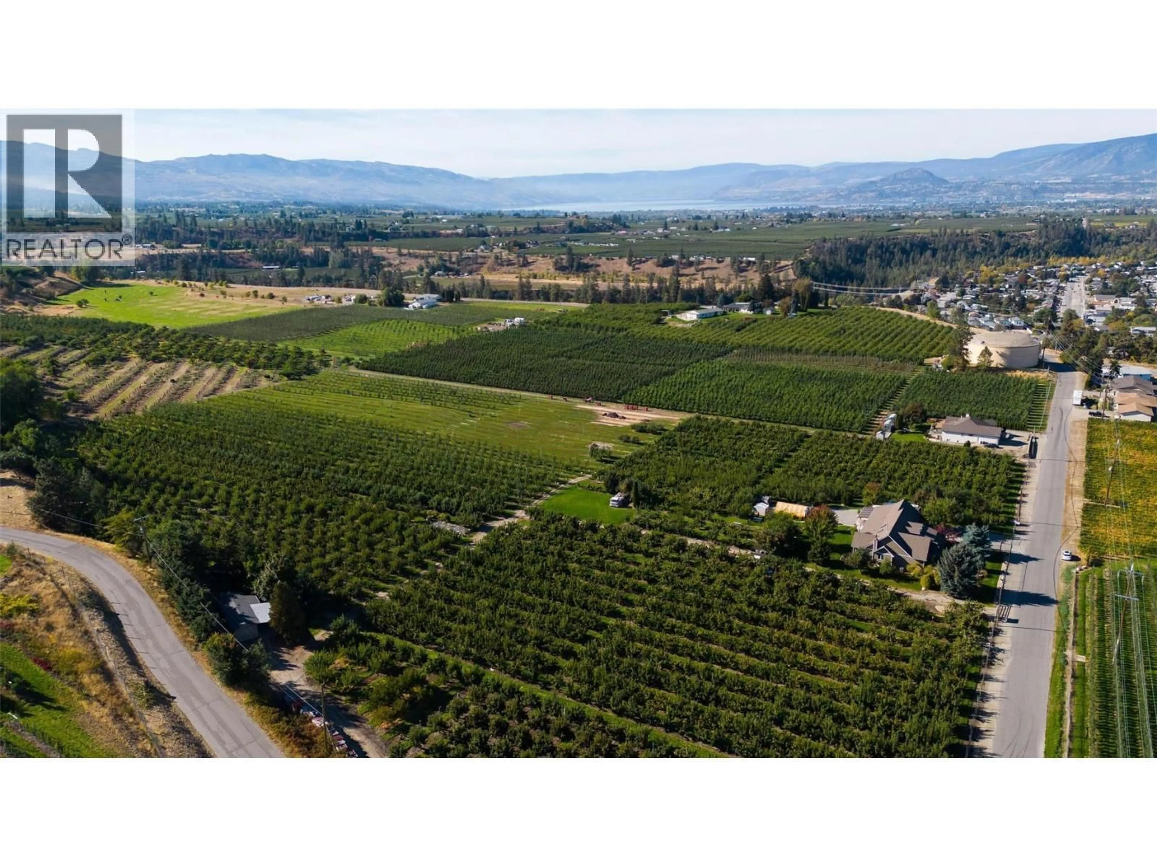 A pic from outside/outdoor area/front of a property/back of a property/a pic from drone, mountain view for TEASDALE ROAD, Kelowna British Columbia V1P1C8