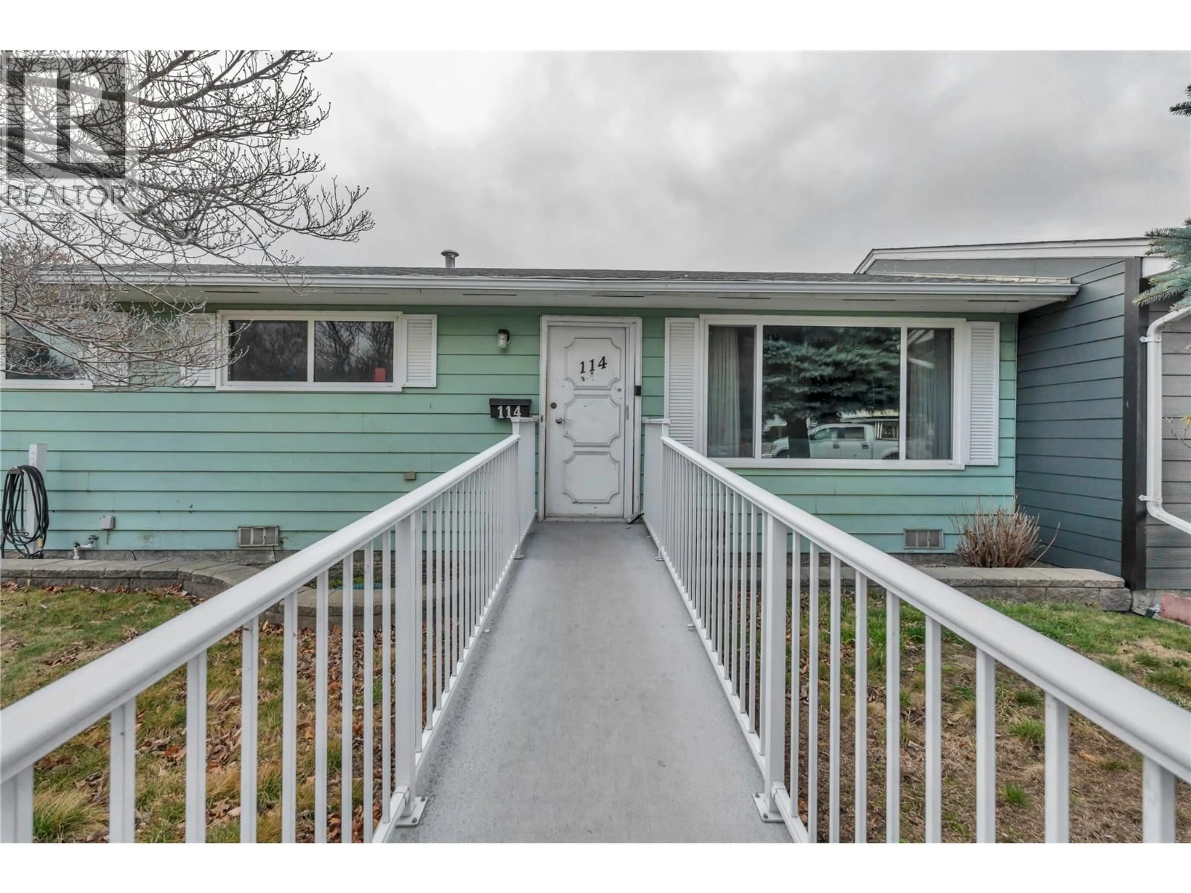 Home with vinyl exterior material, street for 114 AYRES CRESCENT, Penticton British Columbia V2A6R4