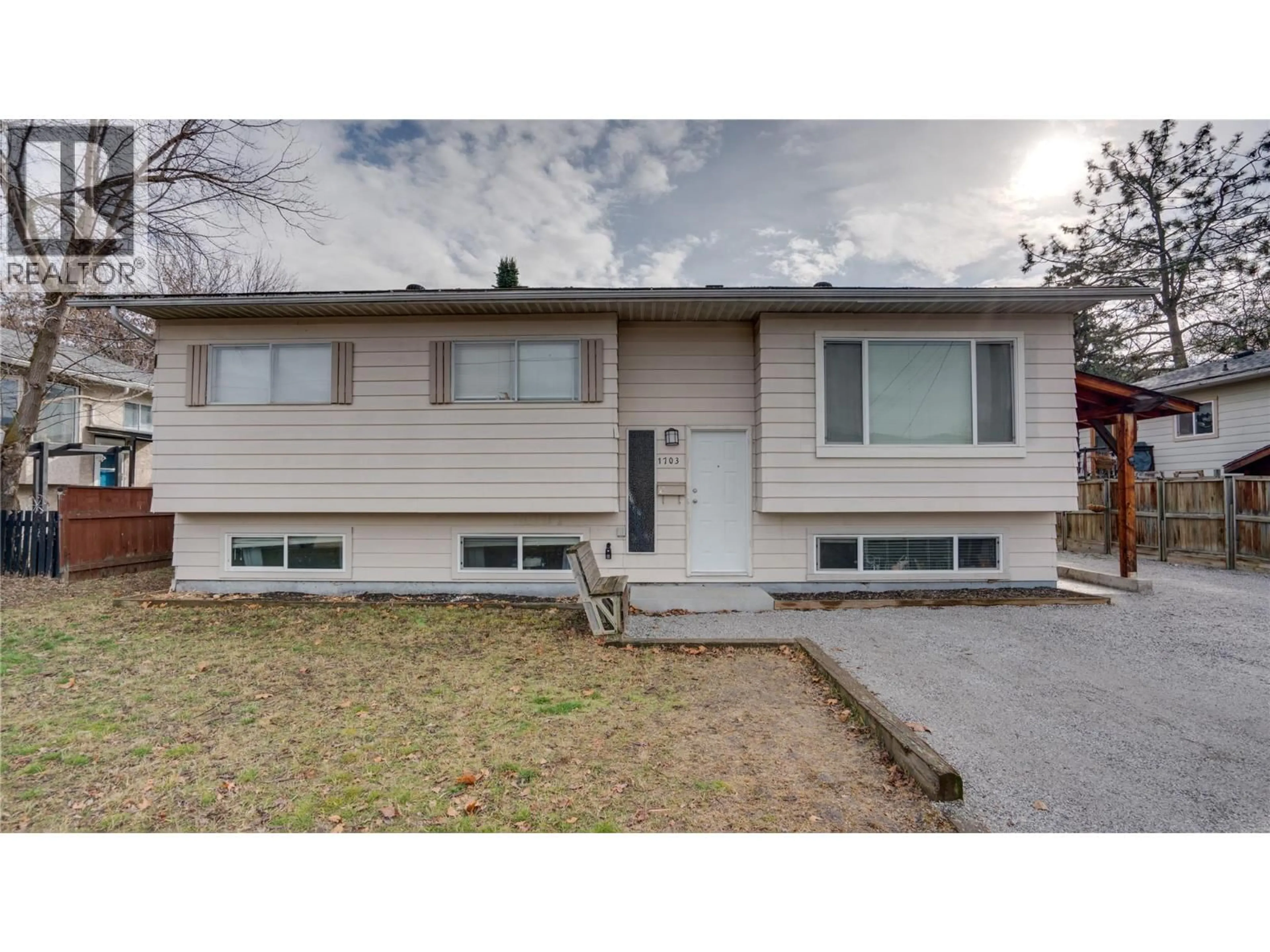 Home with vinyl exterior material, street for 1703 42A STREET, Vernon British Columbia V1T7H2
