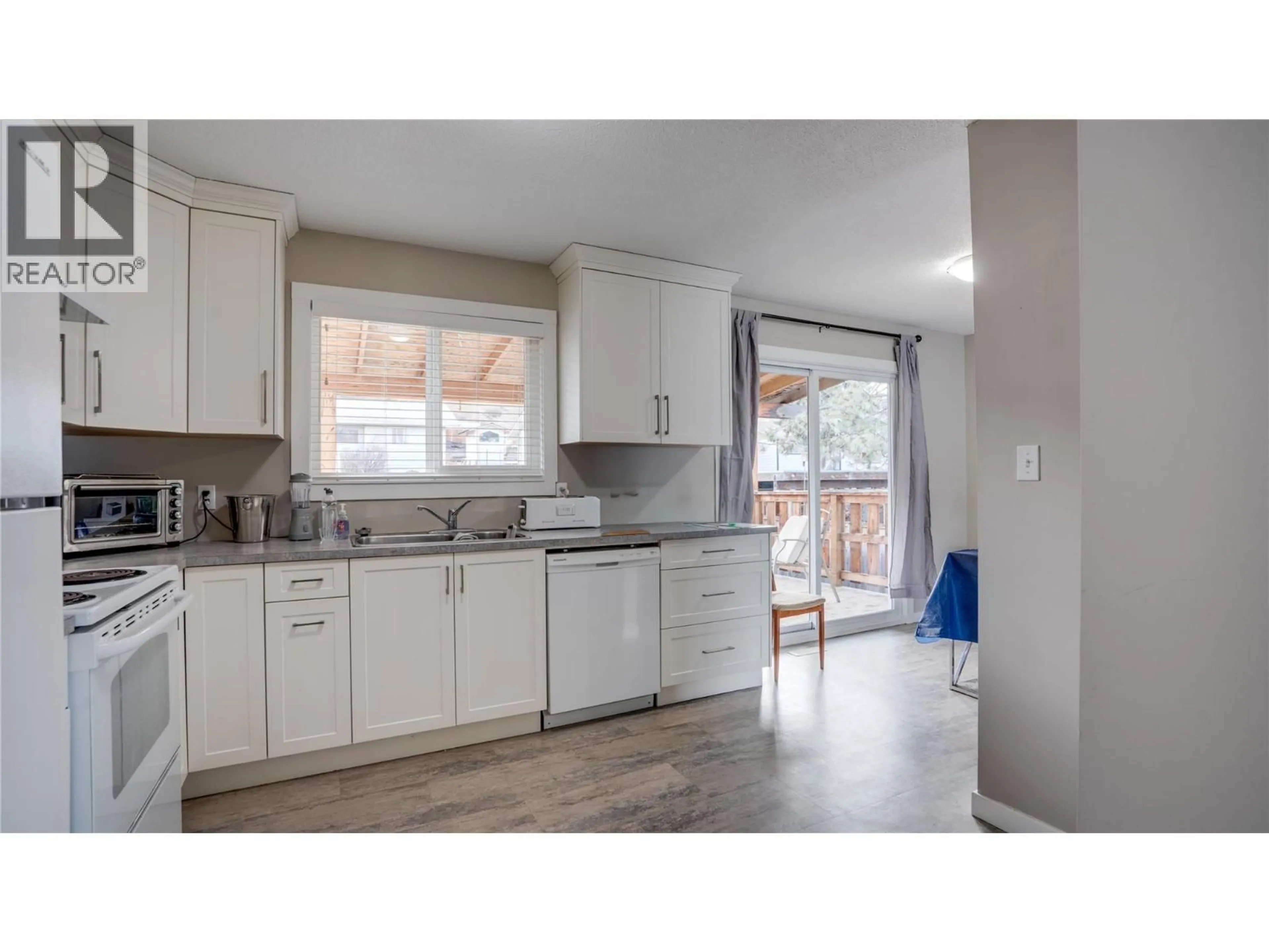 Open concept kitchen, unknown for 1703 42A STREET, Vernon British Columbia V1T7H2