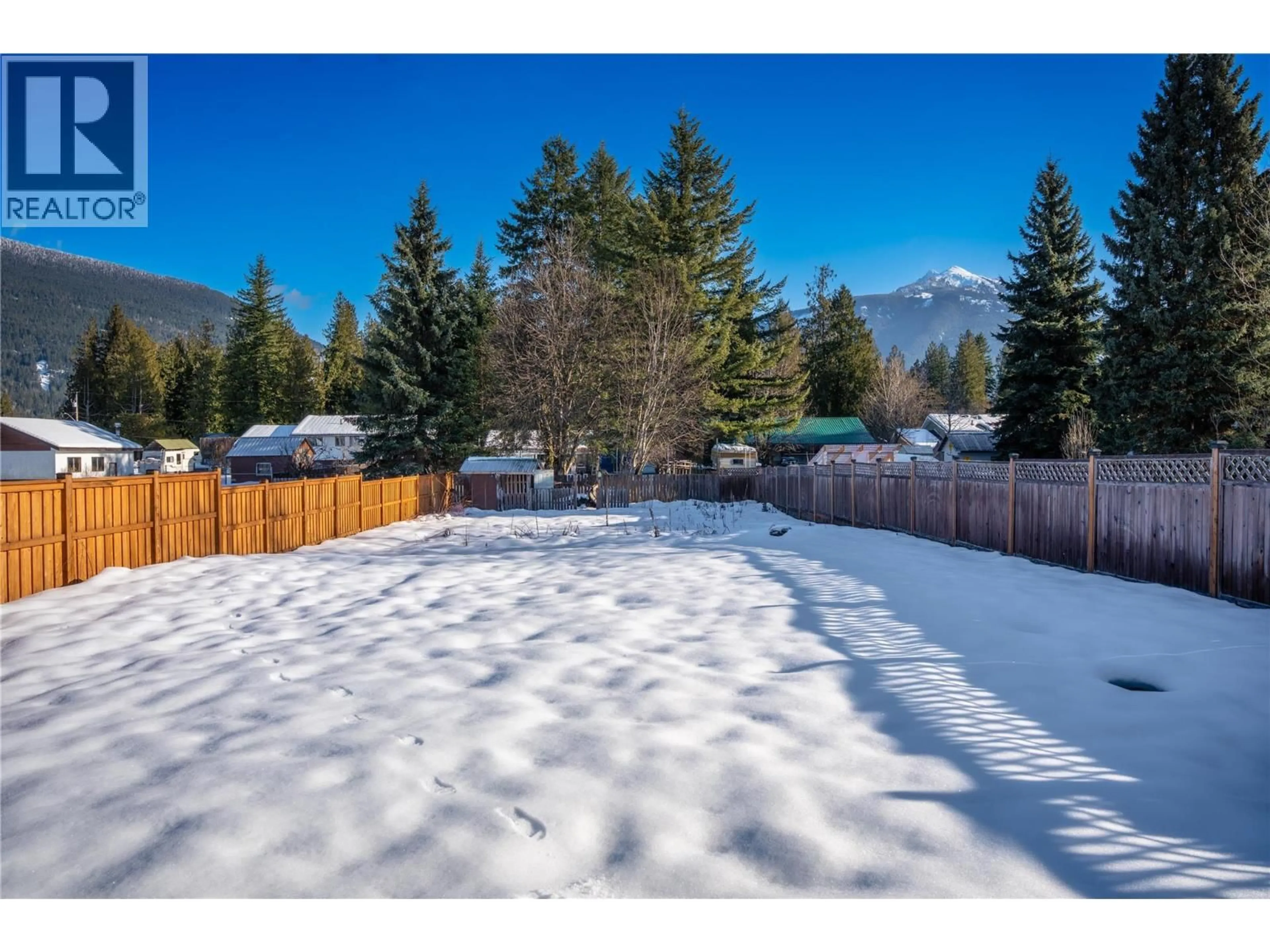 A pic from outside/outdoor area/front of a property/back of a property/a pic from drone, mountain view for 970 BEGBIE ROAD, Revelstoke British Columbia V0E2S0
