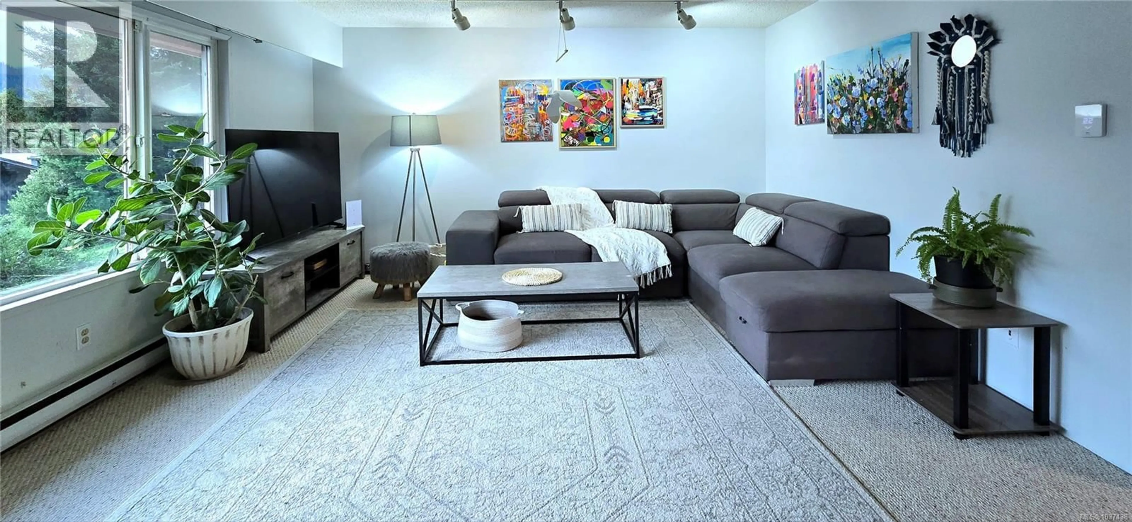 Living room with furniture, unknown for 1112 MAQUINNA AVENUE, Port Alice British Columbia V0N2N0