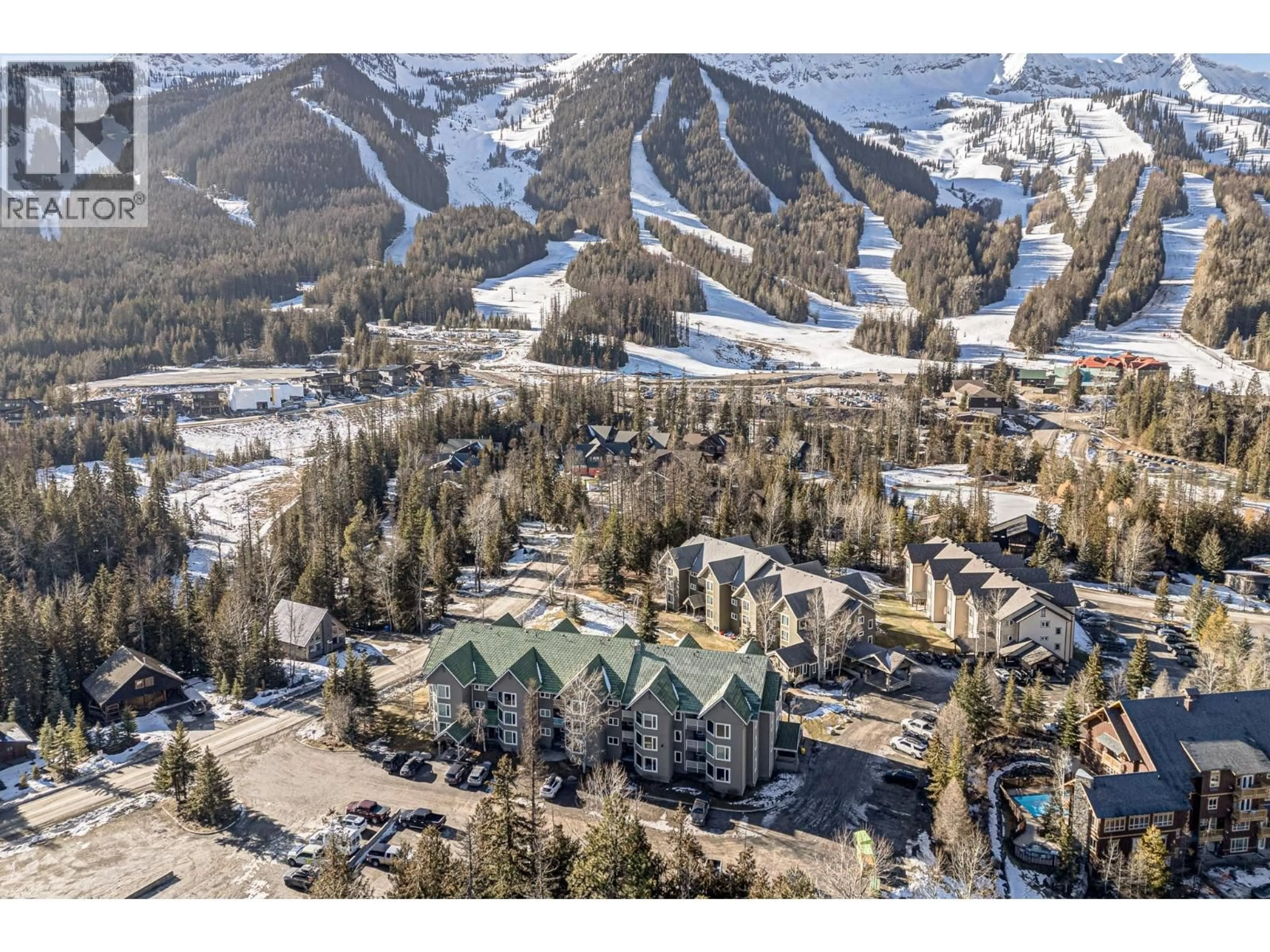 A pic from outside/outdoor area/front of a property/back of a property/a pic from drone, mountain view for 113 - 4559 TIMBERLINE CRESCENT, Fernie British Columbia V0B1M6