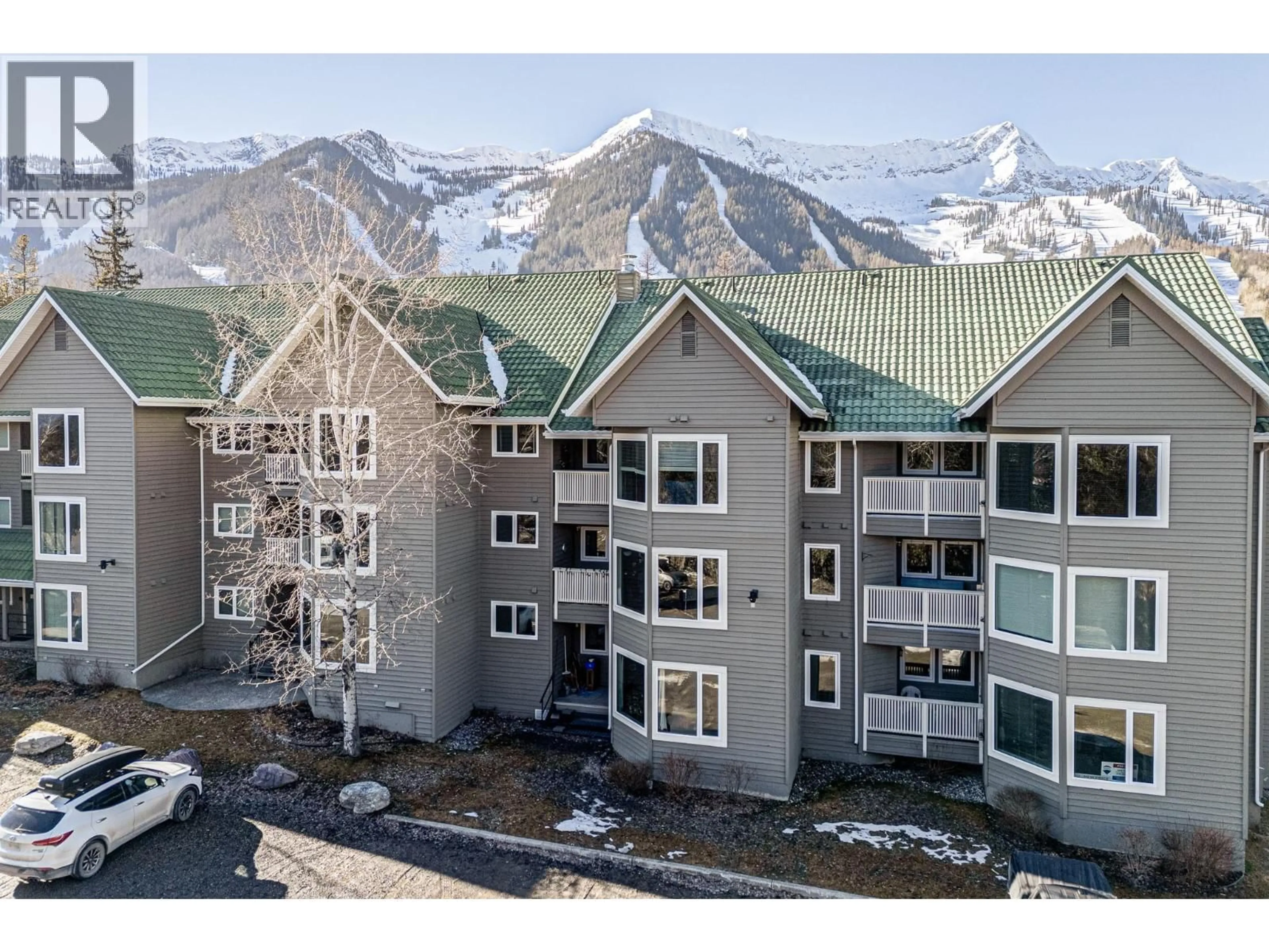 A pic from outside/outdoor area/front of a property/back of a property/a pic from drone, mountain view for 113 - 4559 TIMBERLINE CRESCENT, Fernie British Columbia V0B1M6