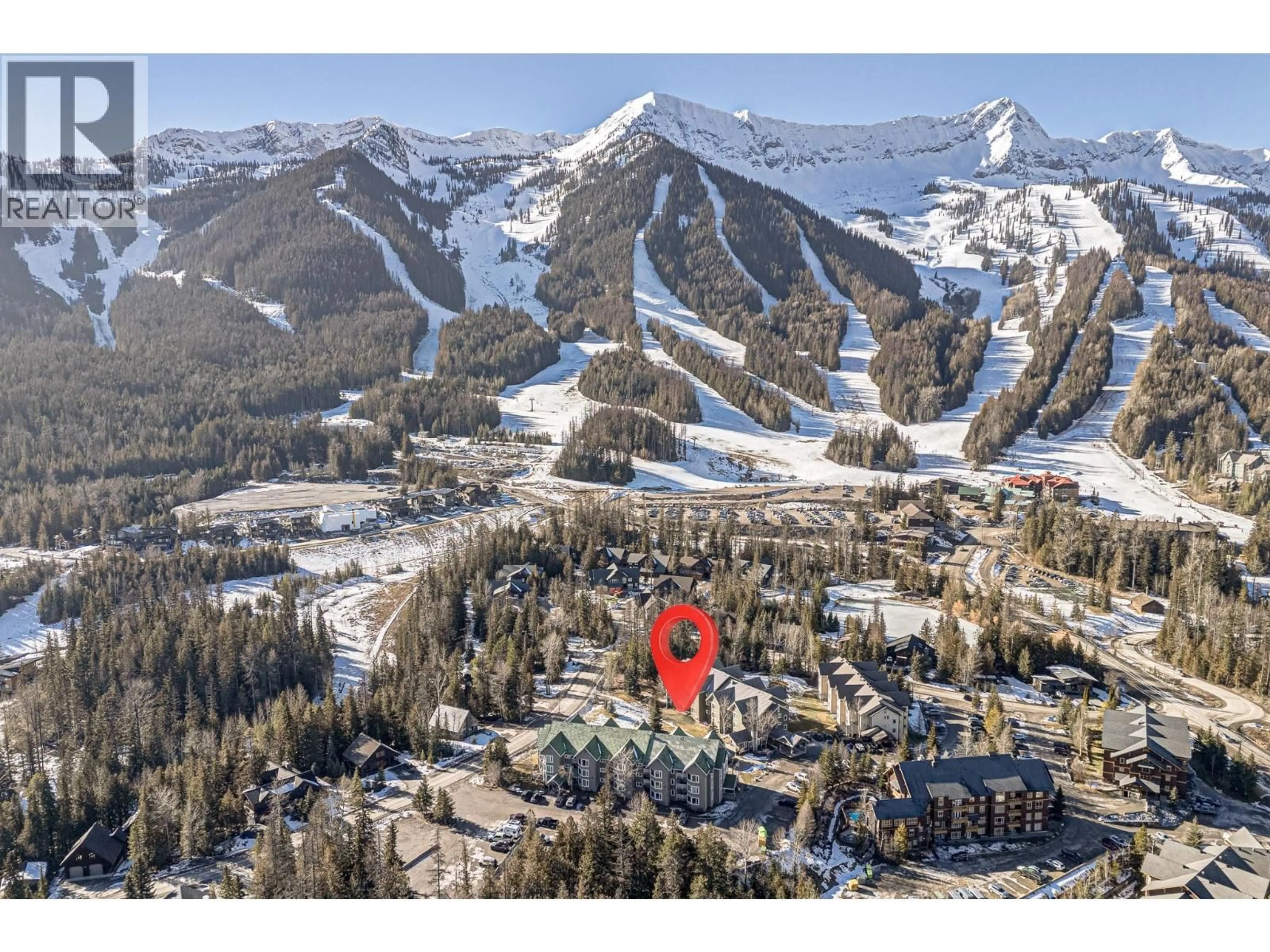 A pic from outside/outdoor area/front of a property/back of a property/a pic from drone, mountain view for 113 - 4559 TIMBERLINE CRESCENT, Fernie British Columbia V0B1M6