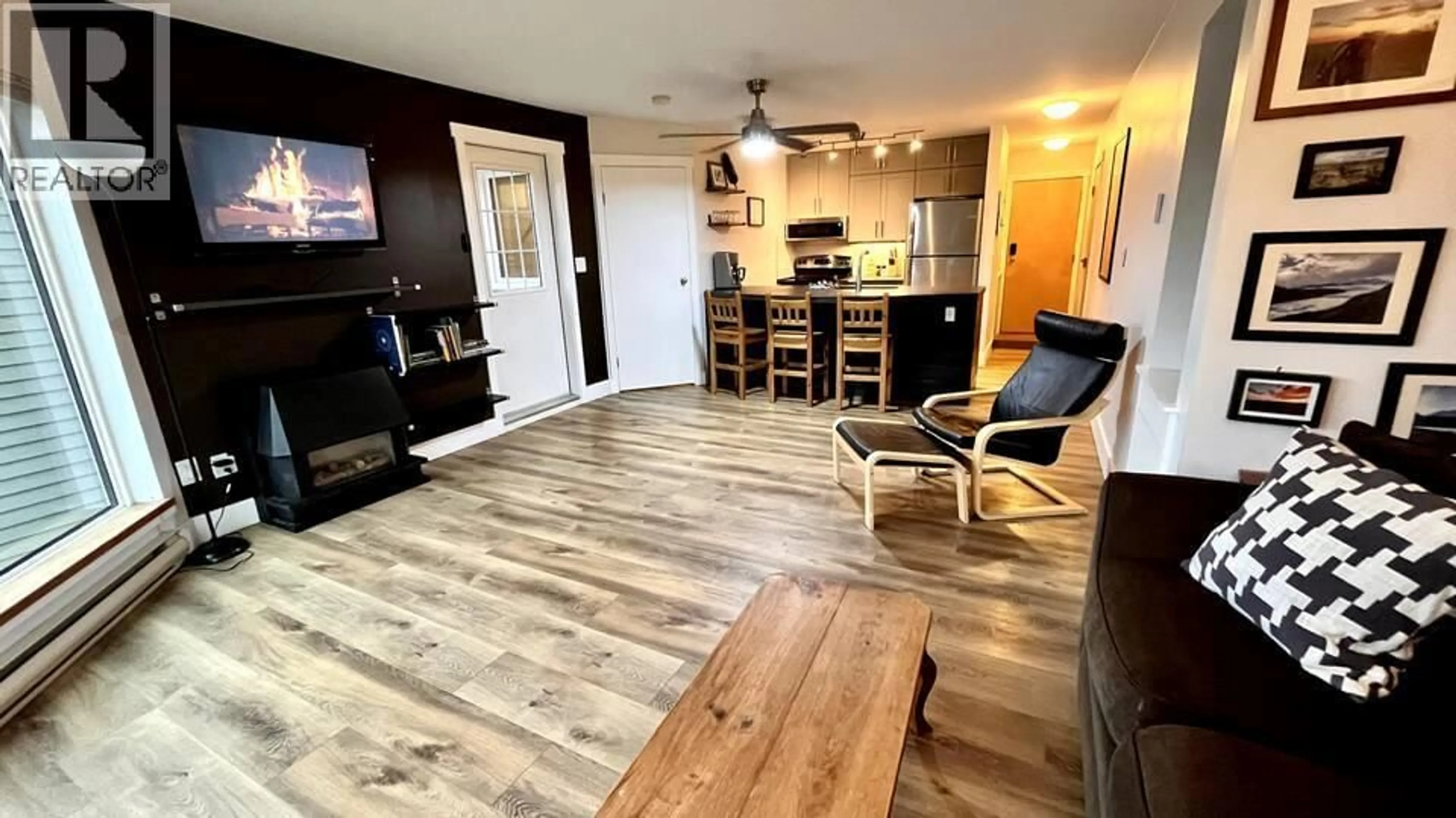 Open concept kitchen, wood/laminate floor for 113 - 4559 TIMBERLINE CRESCENT, Fernie British Columbia V0B1M6