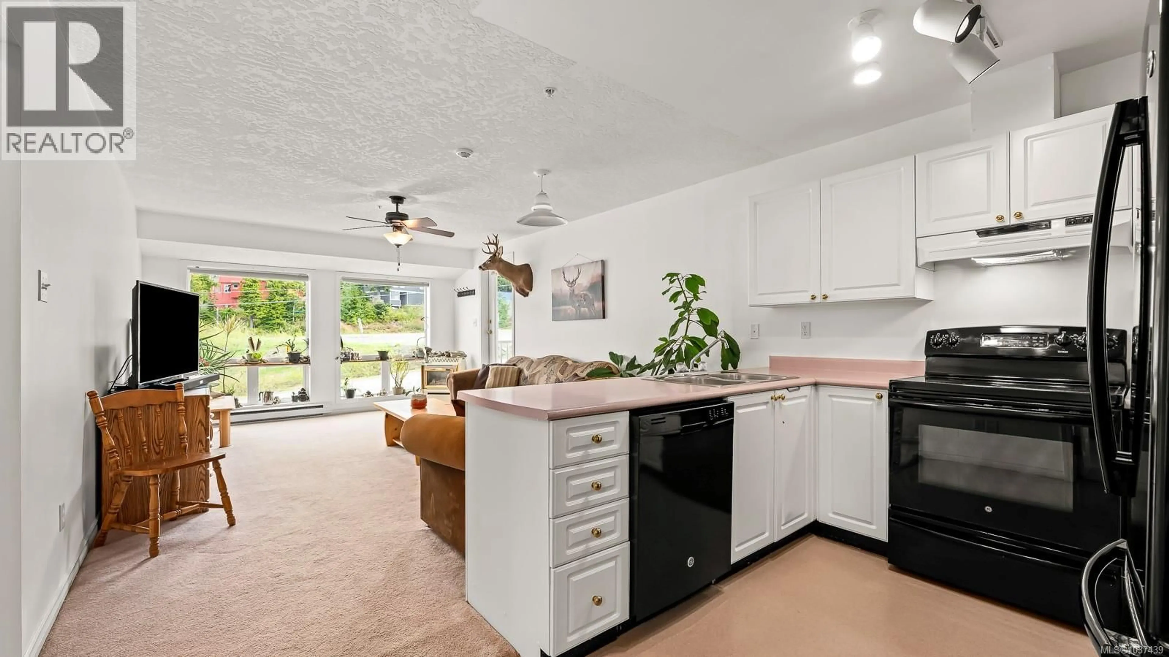 Open concept kitchen, ceramic/tile floor for 502 - 1201 HENRY ROAD, Courtenay British Columbia V9N7P2