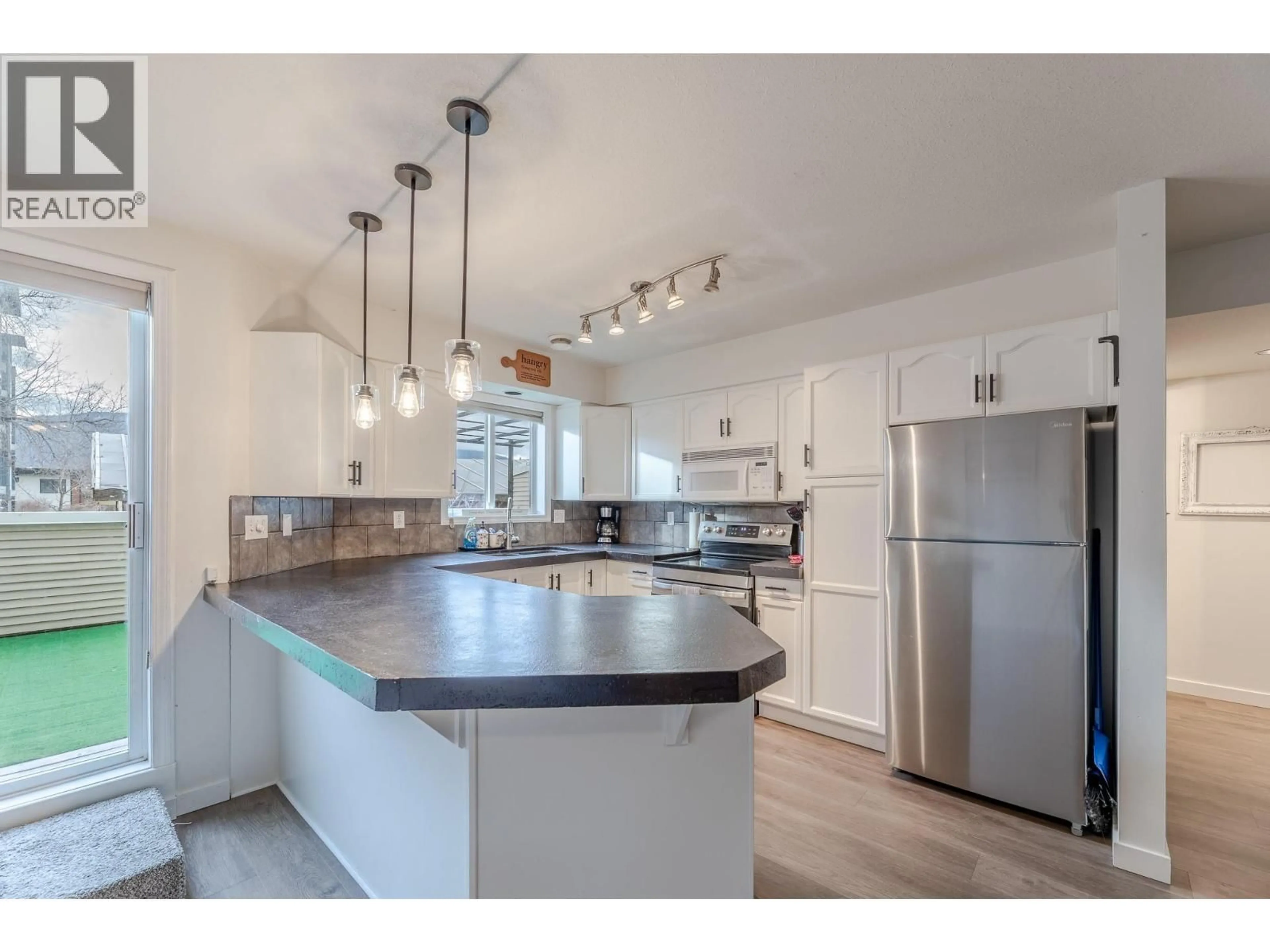 Open concept kitchen, unknown for 105 - 99 CALGARY AVENUE, Penticton British Columbia V2A2T7