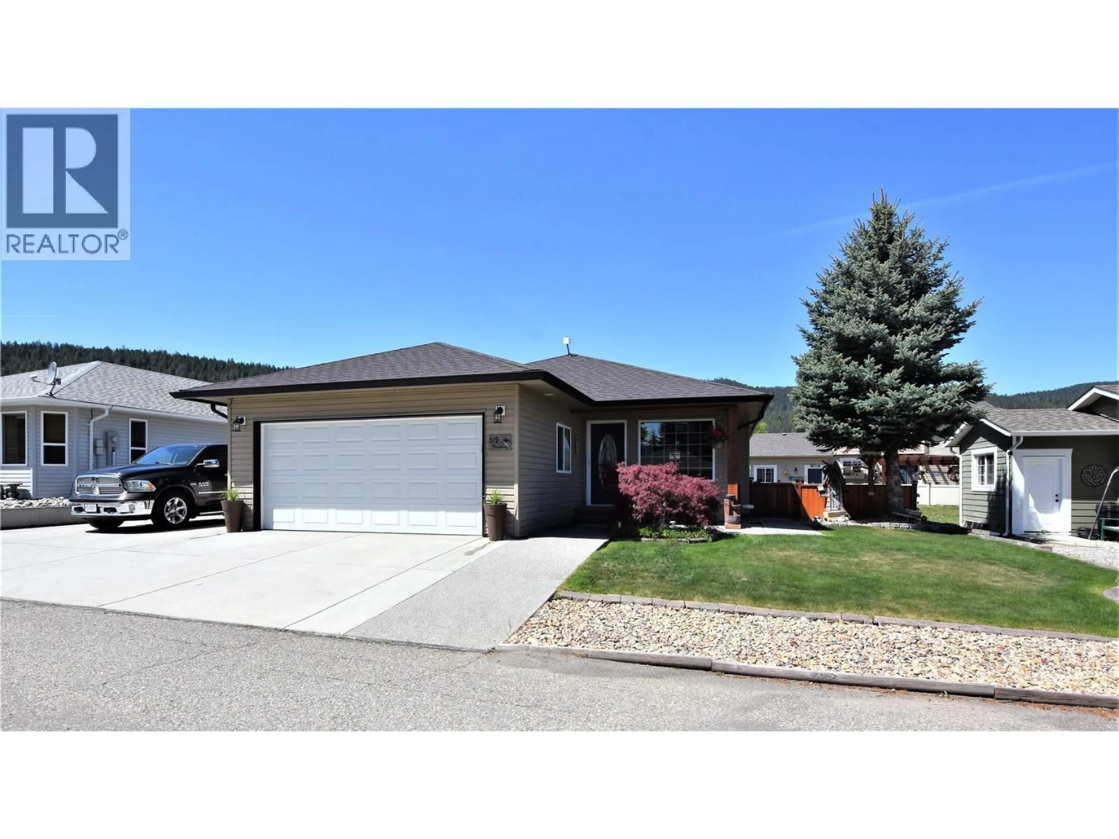 Home with vinyl exterior material, street for 519 LOON AVENUE, Vernon British Columbia V1H2A1