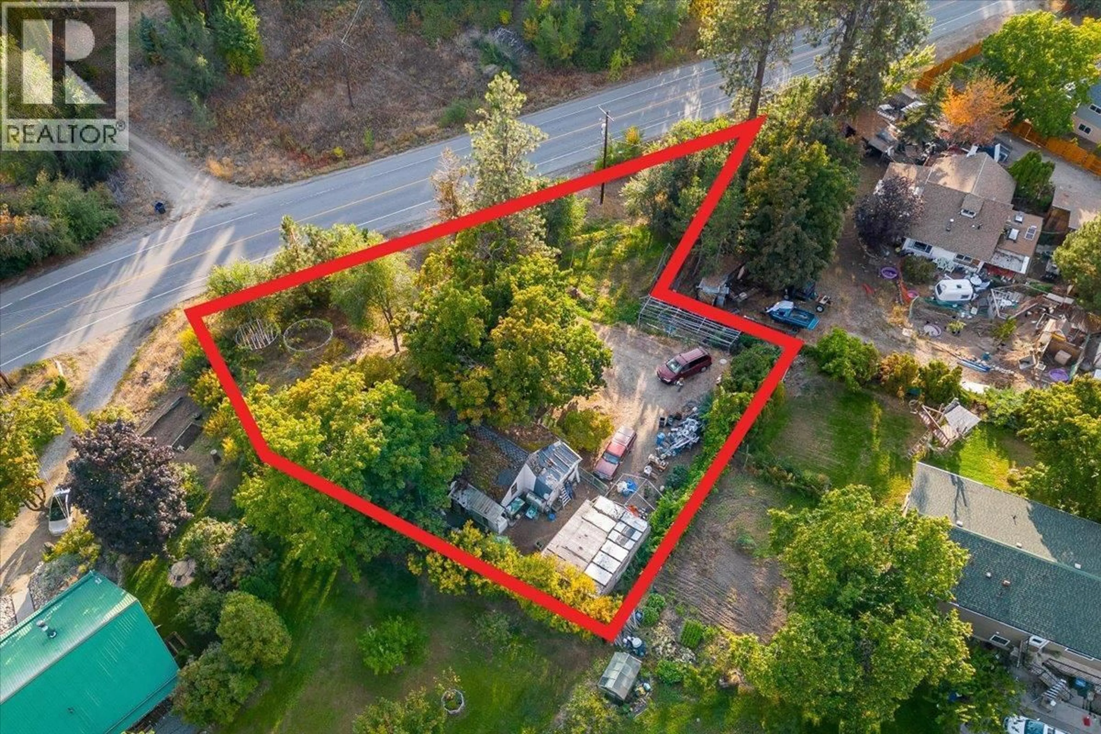 A pic from outside/outdoor area/front of a property/back of a property/a pic from drone, street for 3122 MCCULLOCH ROAD, Kelowna British Columbia V1W4G6
