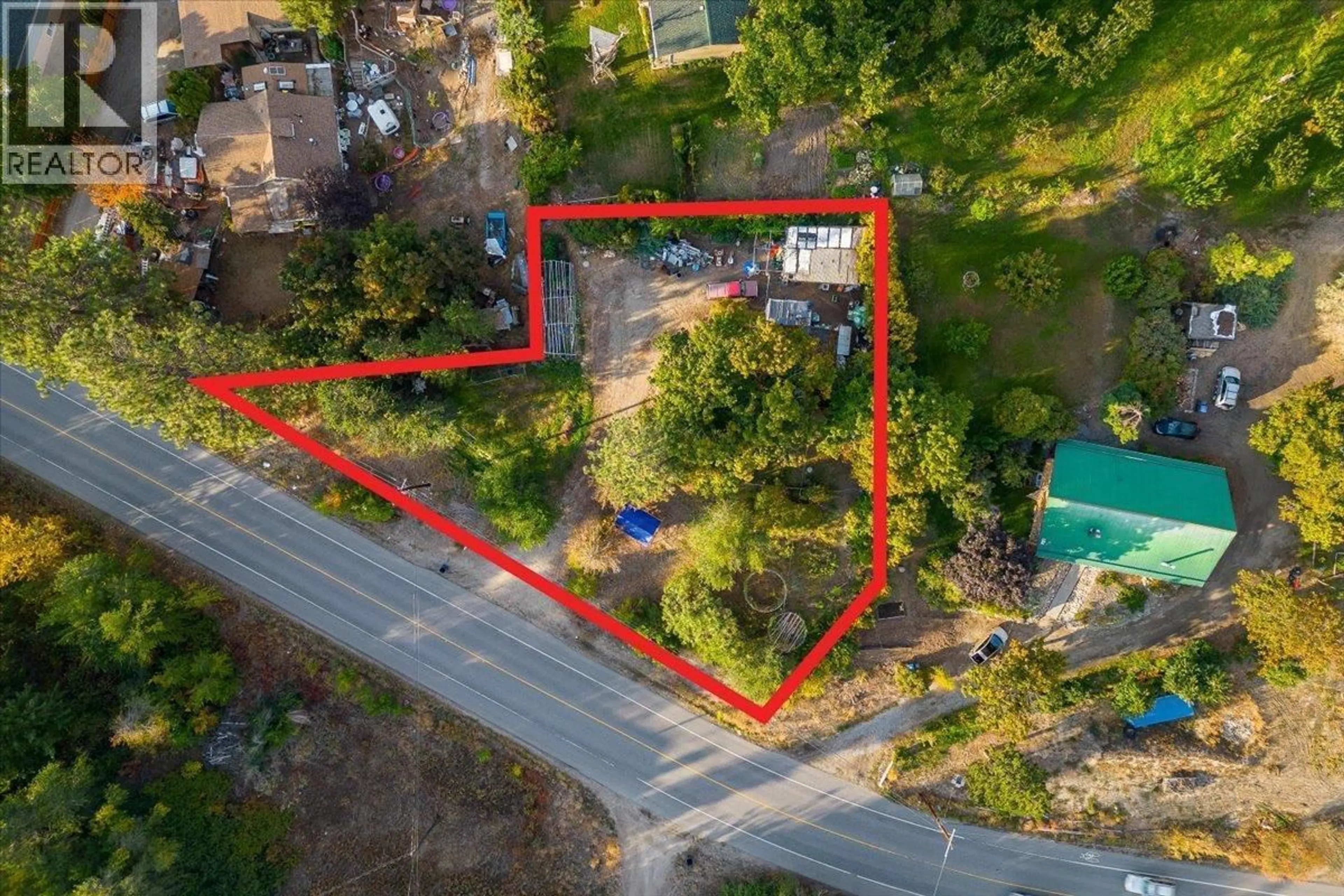 A pic from outside/outdoor area/front of a property/back of a property/a pic from drone, street for 3122 MCCULLOCH ROAD, Kelowna British Columbia V1W4G6